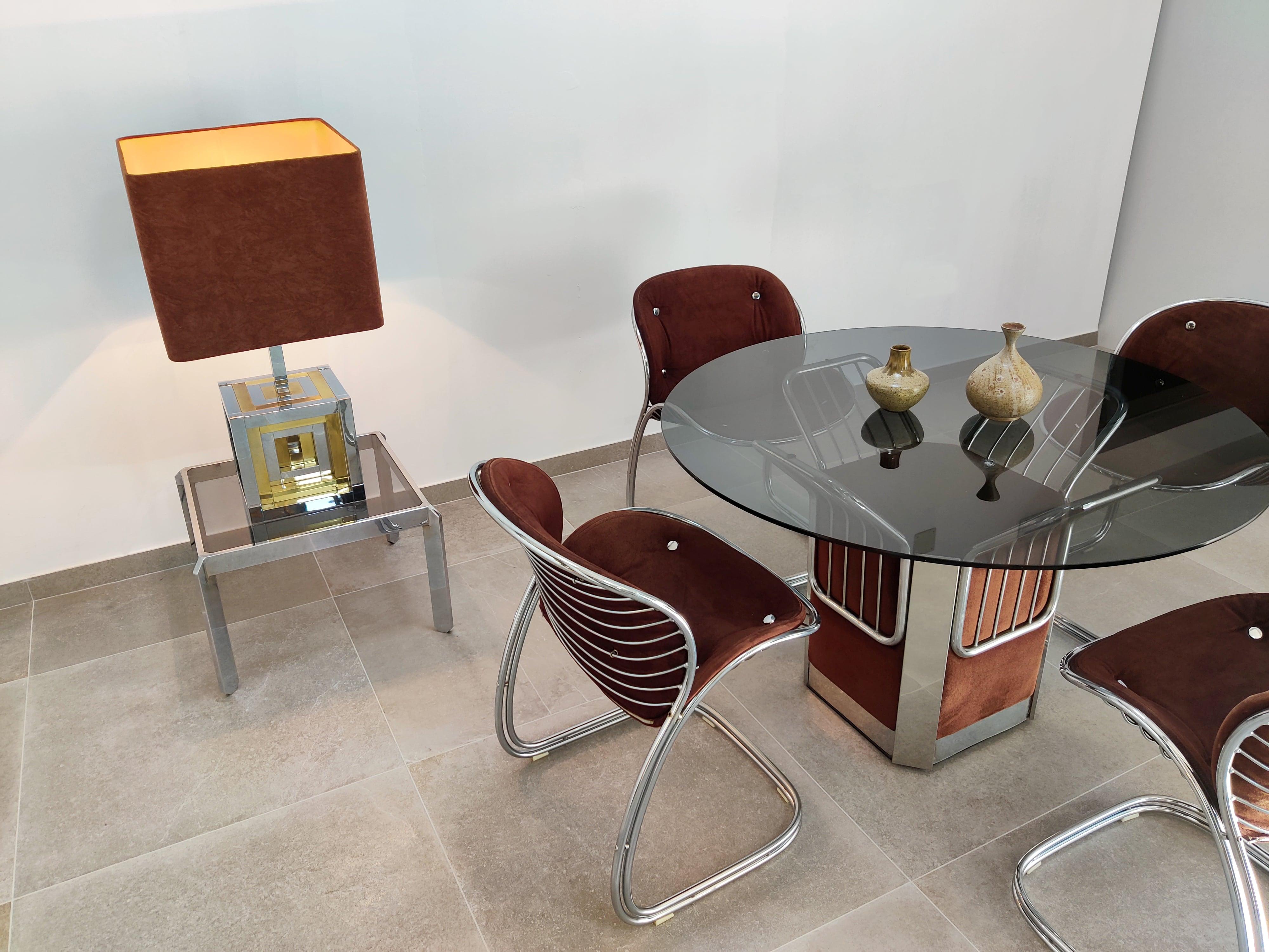 Spectacular set of table and chairs with Sabrina design by Gastone Rinaldi sealed Vidal Grau, with original upholstery.

Dimensions:
Chair: Width 53 cm x height 80 cm x depth 55 cm -- Seat height 50 cm
Table: glass 115 cm x 71.5 cm high.