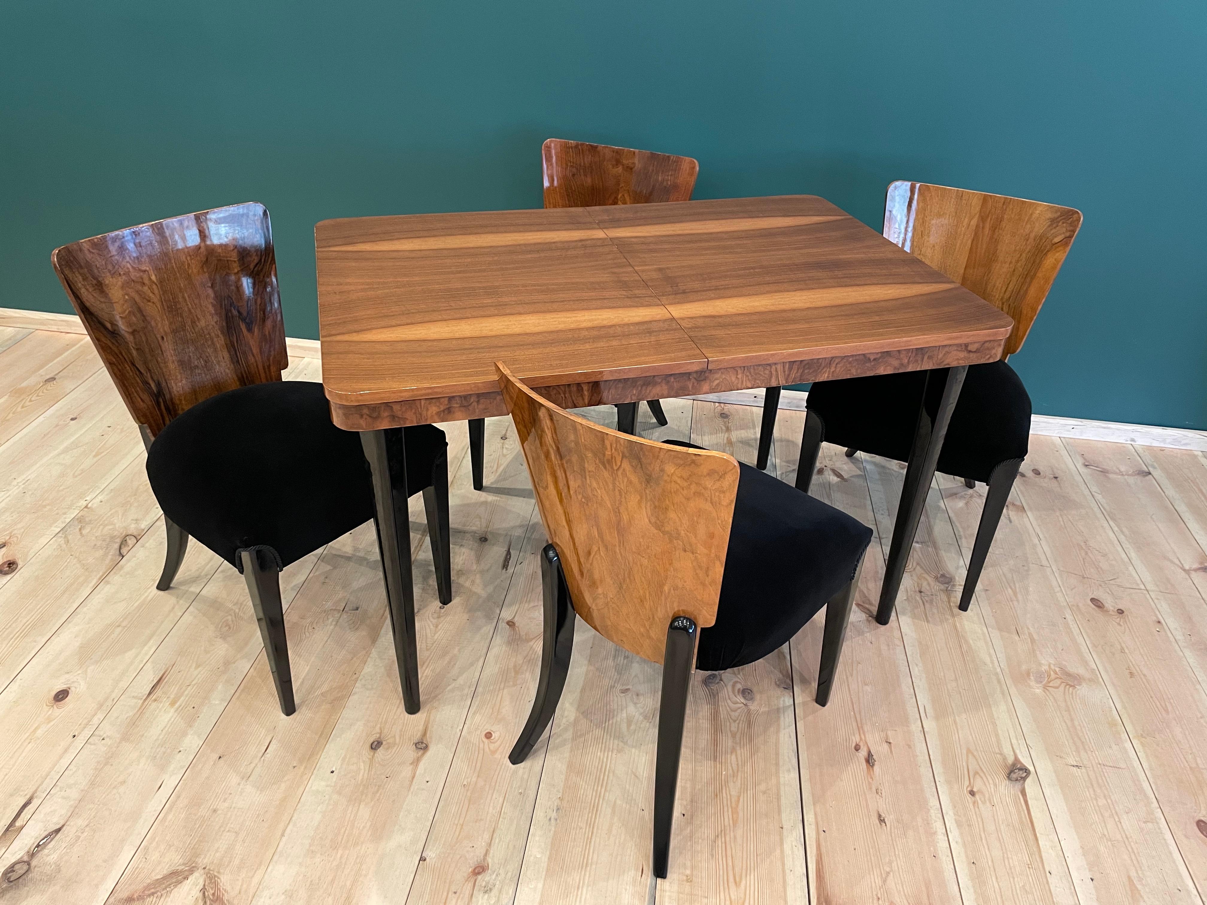 We present Art Deco dining furniture that includes a table and four chairs. A set from 1940, designed by a famous Czech designer
Jindrich Halabala, (a Czech designer ranked among the most outstanding creators of the modern period. The peak of his