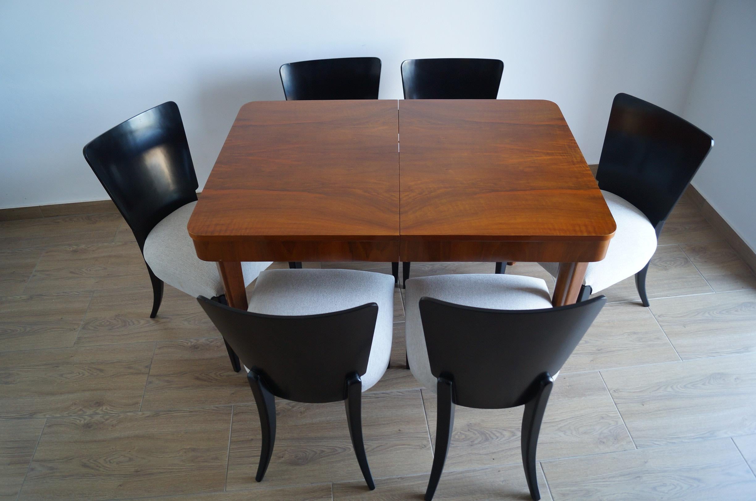 We present Art Deco dining furniture that includes a table and six chairs. A set from 1940, designed by a famous Czech designer
Jindrich Halabala - (a Czech designer ranked among the most outstanding creators of the modern period. The peak of his