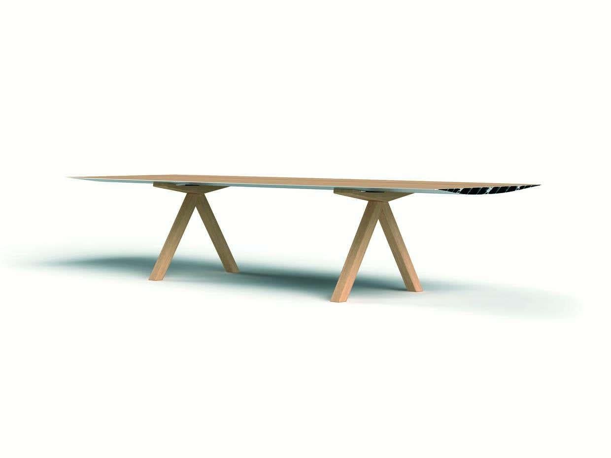 Table B, 360 cm with wooden legs - Top laminated

Materials: 
Aluminium, ash ,oak

Dimensions: 
D 120 cm x W 360 cm x H 73 cm

The Table B, which inaugurated the Extrusions Collection in 2009, can reach up to five metres using a simple