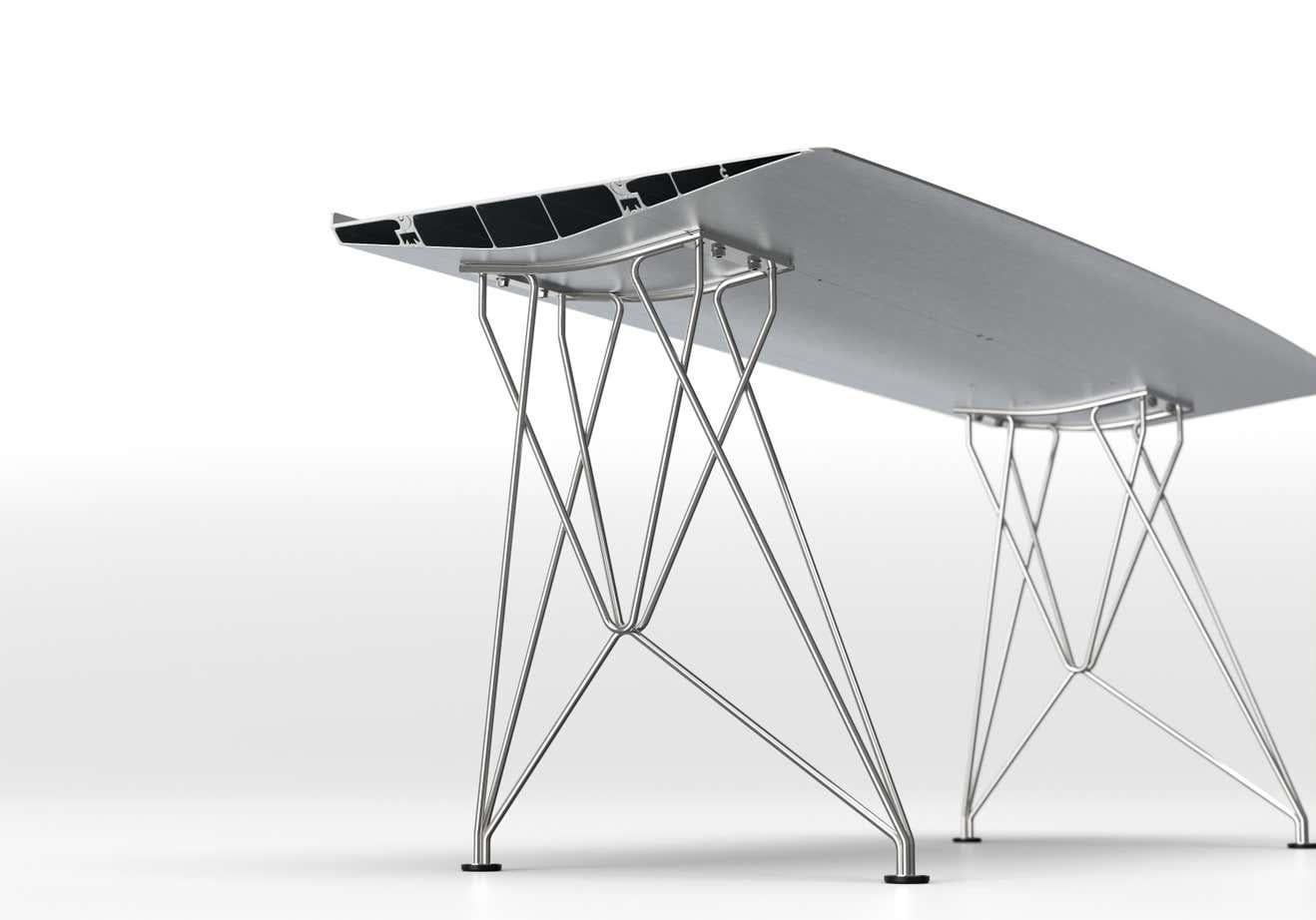 21stCentury Table B Desk Konstantin Grcic Top Anodized Silver with Inox Legs

Materials: 
Aluminium, stainless steel

Dimensions: 
D 70 cm x W 180 cm x H 74 cm

The Table B, which inaugurated the Extrusions Collection in 2009, can reach up