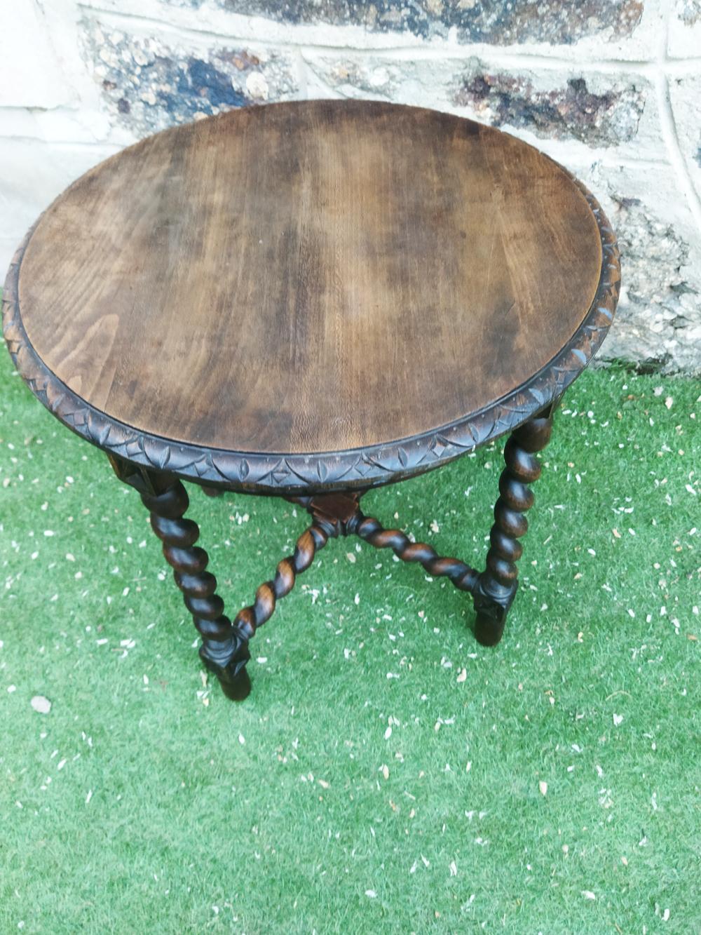 Round side table features barley twist legs, 19th or 18th century  

It is a typical table of the Spanish Renaissance,. Possibly very old, but I cannot specify the exact concrete date. This is Europe, here we live with furniture and buildings that