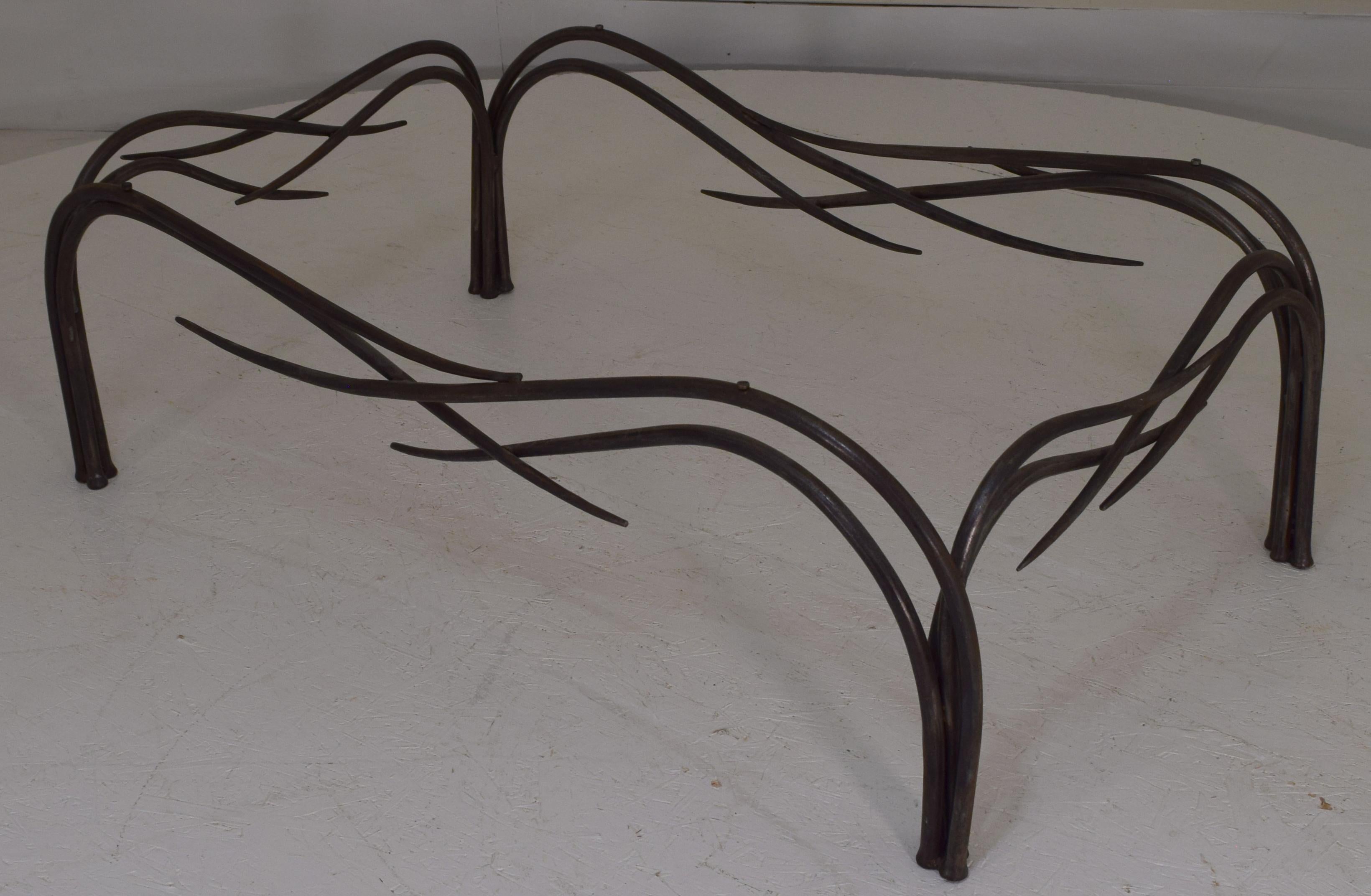 Commissioned from Jeff Fetty in 1994, this wrought iron table is known as 