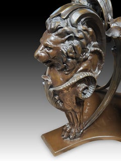 Table base in bronze with four lions. Based on models derived from Rome