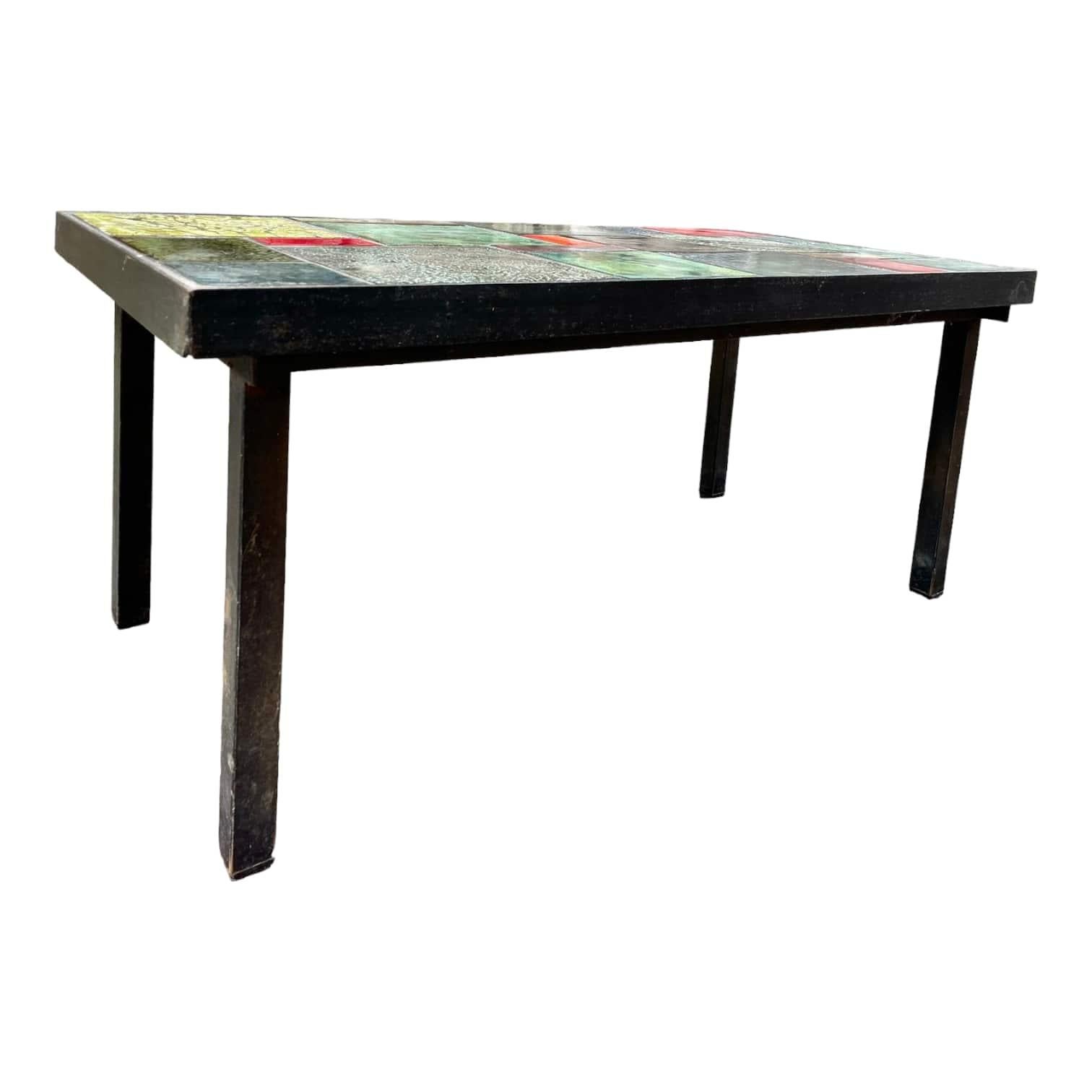 Discover these superb French ceramist coffee table designed around 1970, which will bring a touch of elegance and charm to your interior. Each piece is carefully selected for its quality and authenticity, ensuring added value to your collection. The