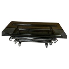 Table basse en verre fumé et tubes chromés, style Willy Rizzo (1970s)