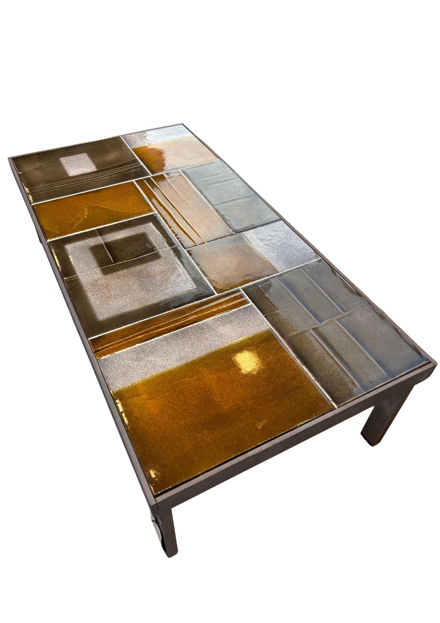 Coffee table by French ceramic artist Roger Capron 
Glazed ceramic top, metal frame, engobe relief on lava