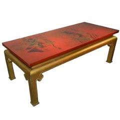 table basse laquée rouge et dorée, décorée de motifs chinois, vers 1950