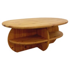 Table basse moderniste ovale vintage en pin massif des années 70 80