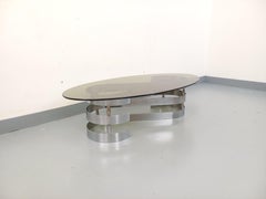 Table basse ovale vintage en verre fumé et métal chromé des années 70