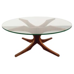 Table basse ronde vintage Hugues Poignant, en palissandre et verre des années 60
