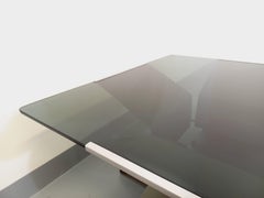 Table basse vintage carrée de François Monnet en acier et verre fumé années 70
