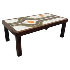 Table basse vintage en bois foncé et céramique de Vallauris signée Jean d'Asti