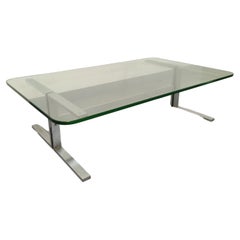 Table basse vintage en verre transparent et fonte d'aluminium des années 70