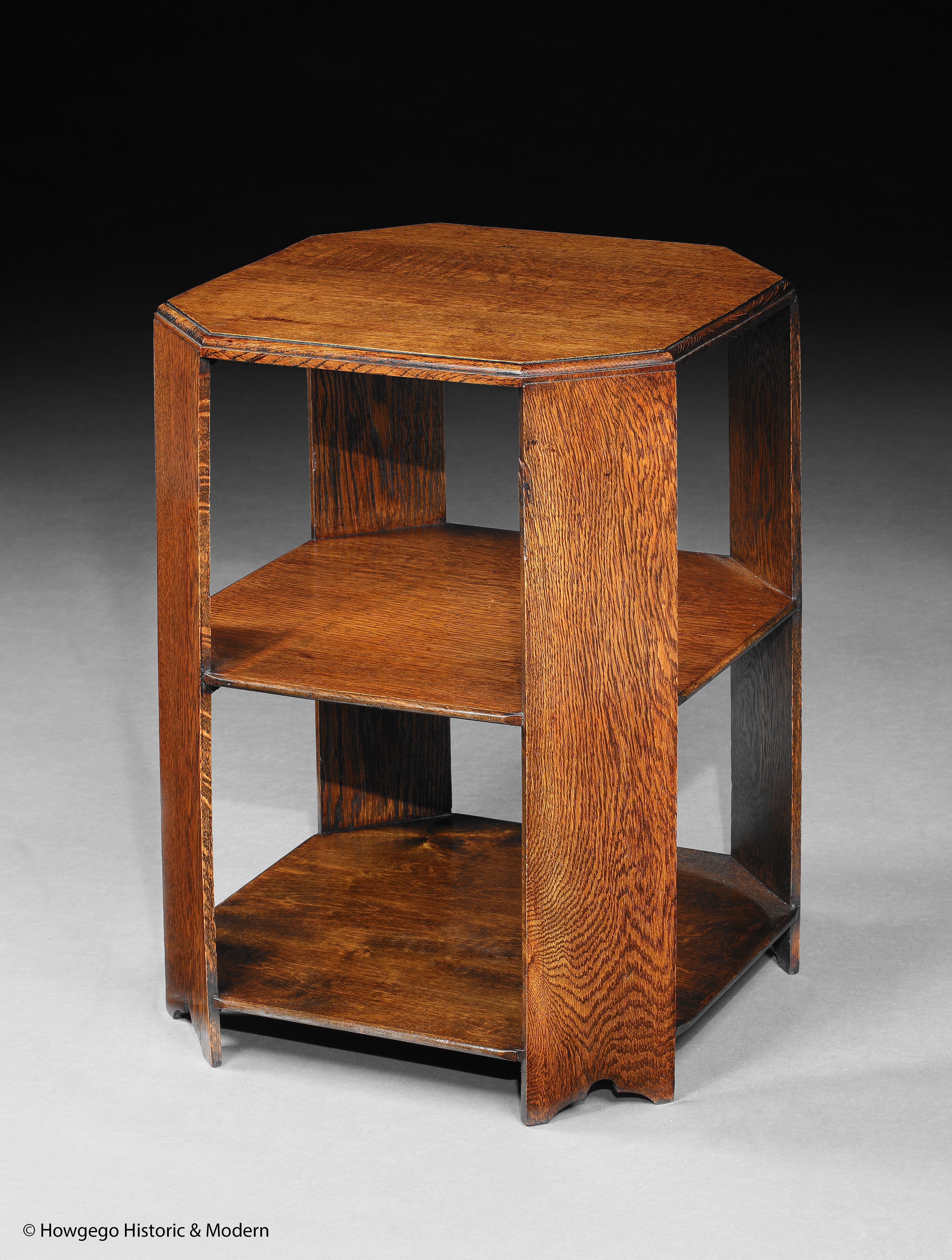 - Classic Arts & Crafts design attributed to Heals
- Elegant architectural form with the angled supports creating the octagonal shape
- Lovely oak figuring creating beautiful pattering, rich colour and patina
- Small proportions which are