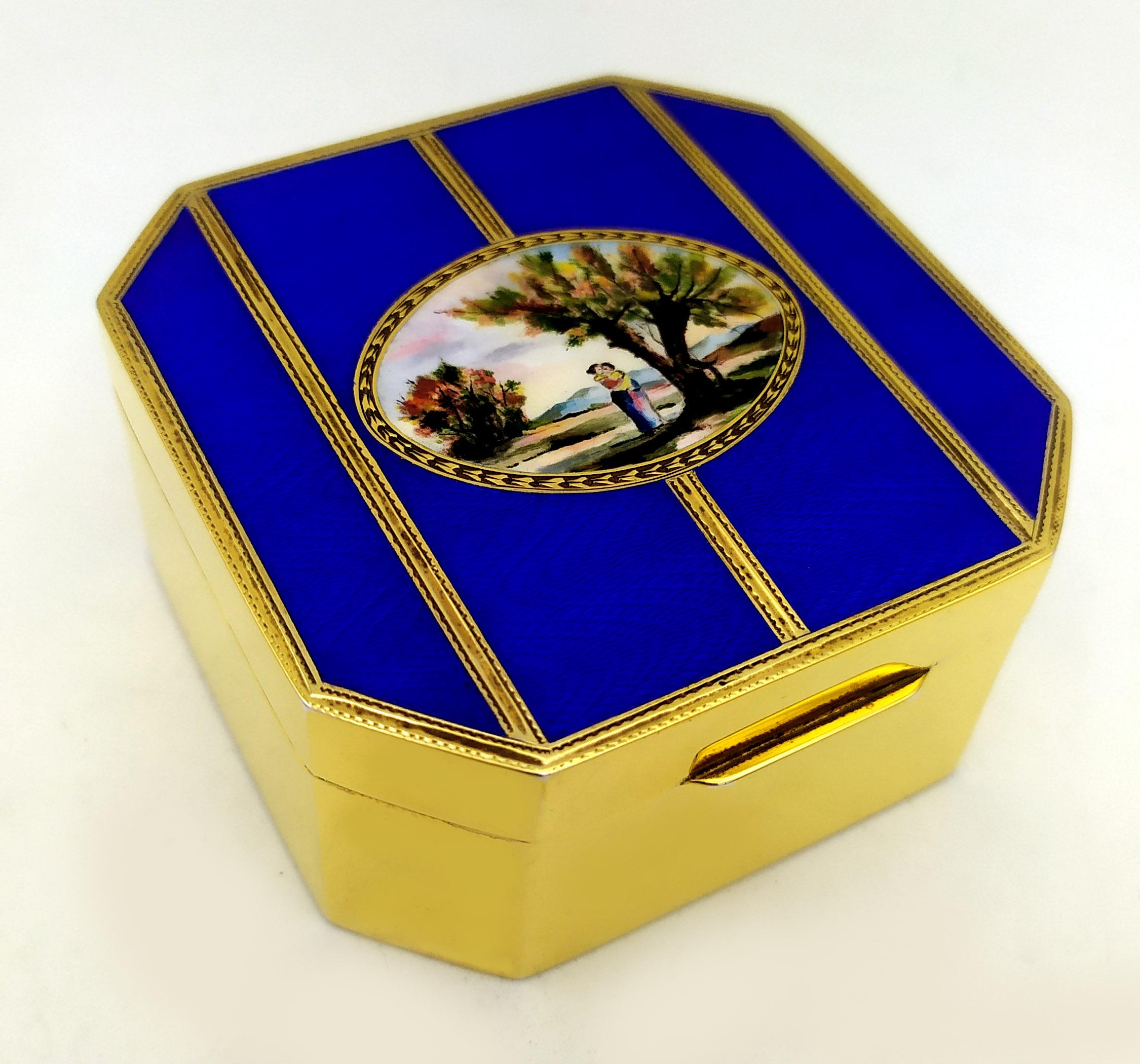 Octagonal table box in 800/1000 silver gold plated with translucent enamel on guilloché and beautiful enamel miniature hand painted by the painter Renato Dainelli in early 1900s English style. Size cm. 8 x 8 x 3.7. Weight gr. 237. Designed by Franco