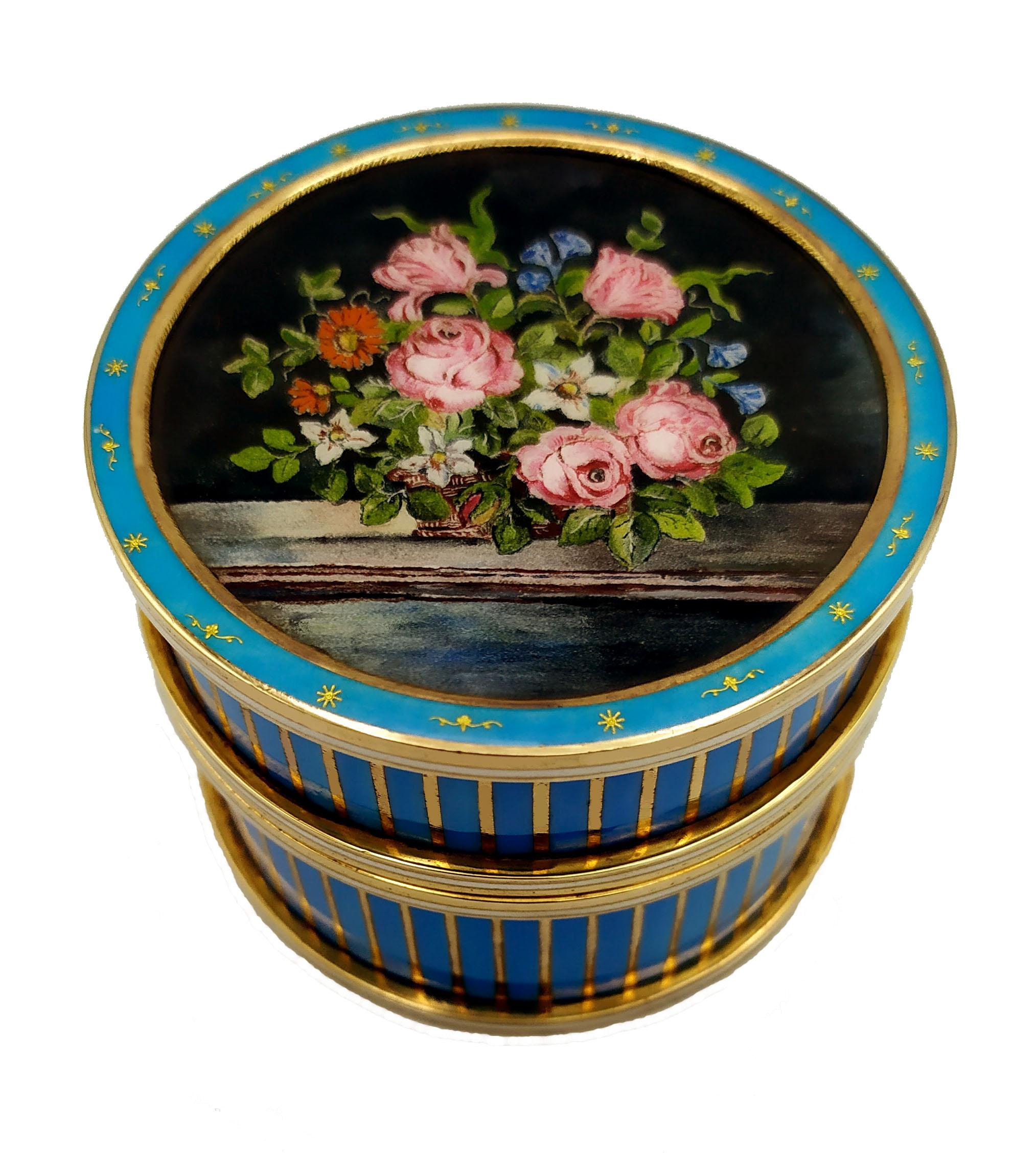 Round table box in 925/1000 sterling silver gold plated with fired enamels, with “paillons” in pure gold on the upper circle, fine floral miniature fired enamelled by the painter Renato Dainelli, enamelled border with vertical stripes. Napoleon III