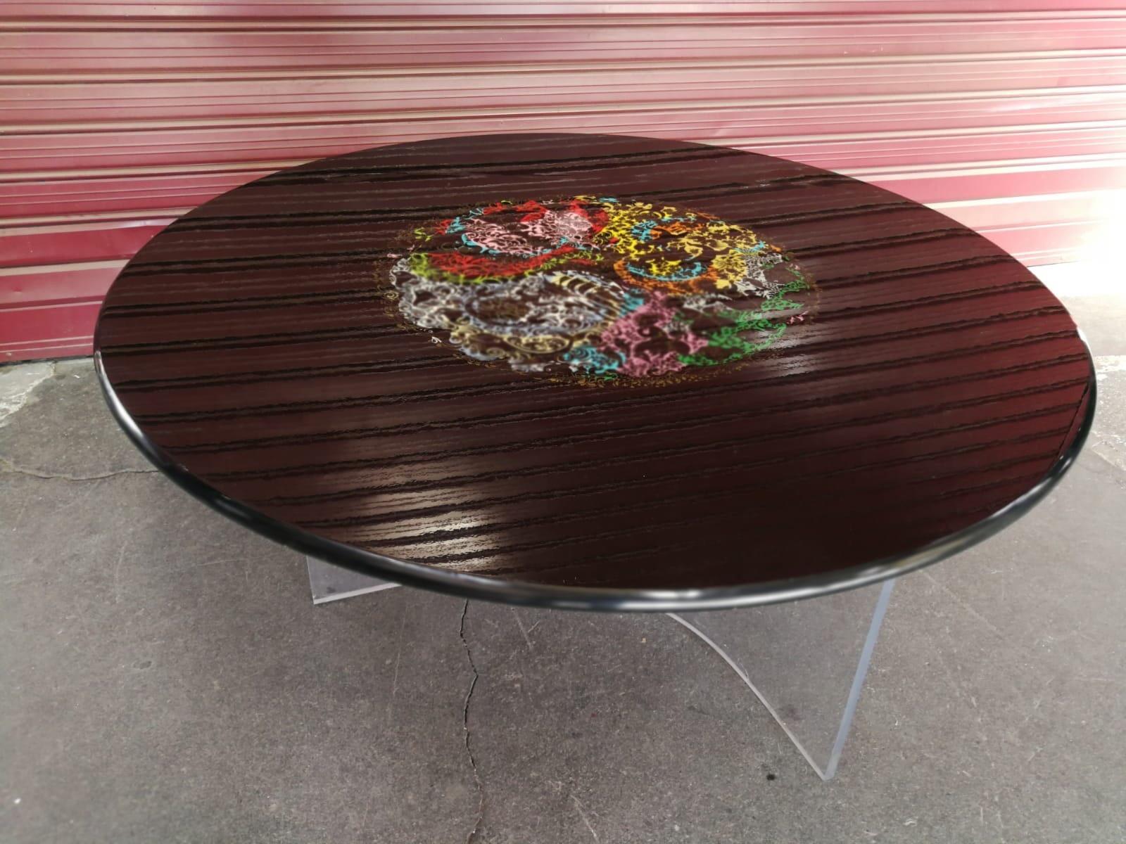 Lacquered table by Bjørn Wiinblad born in 1918 and international ’rock star’ passed in 2006 a large cooperation with Rosenthal.


 