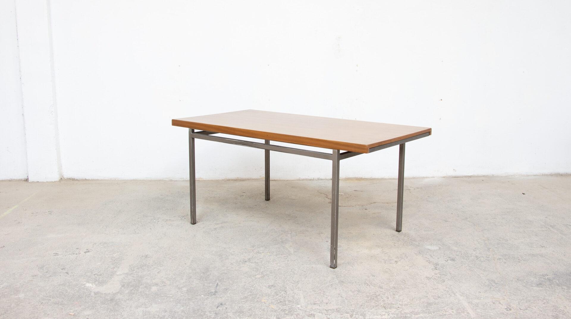 Dining table by Georges Frydman for EFA.
Rectangular walnut dining table from the 1960s by Georges Frydman for the manufacturer EFA.

It perfectly represents French modernism of the 1950s with its use of wood and steel.

Can be used as a desk.

The