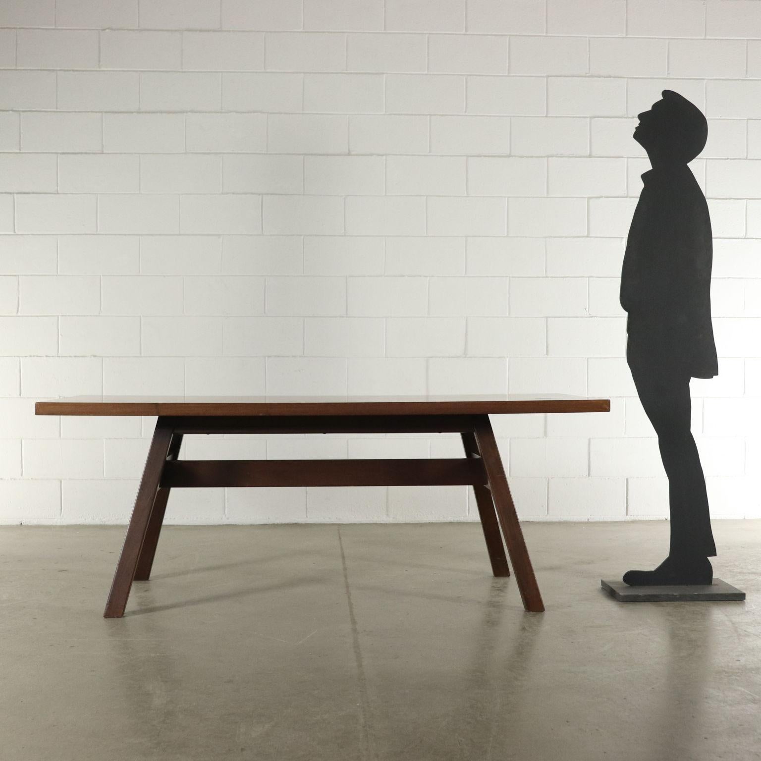 A table designed by Giovanni Michelucci (1891-1990) for Poltronova. Walnut veneer. Model: Torbecchio. Manufactured in Italy, 1960s-1970s.