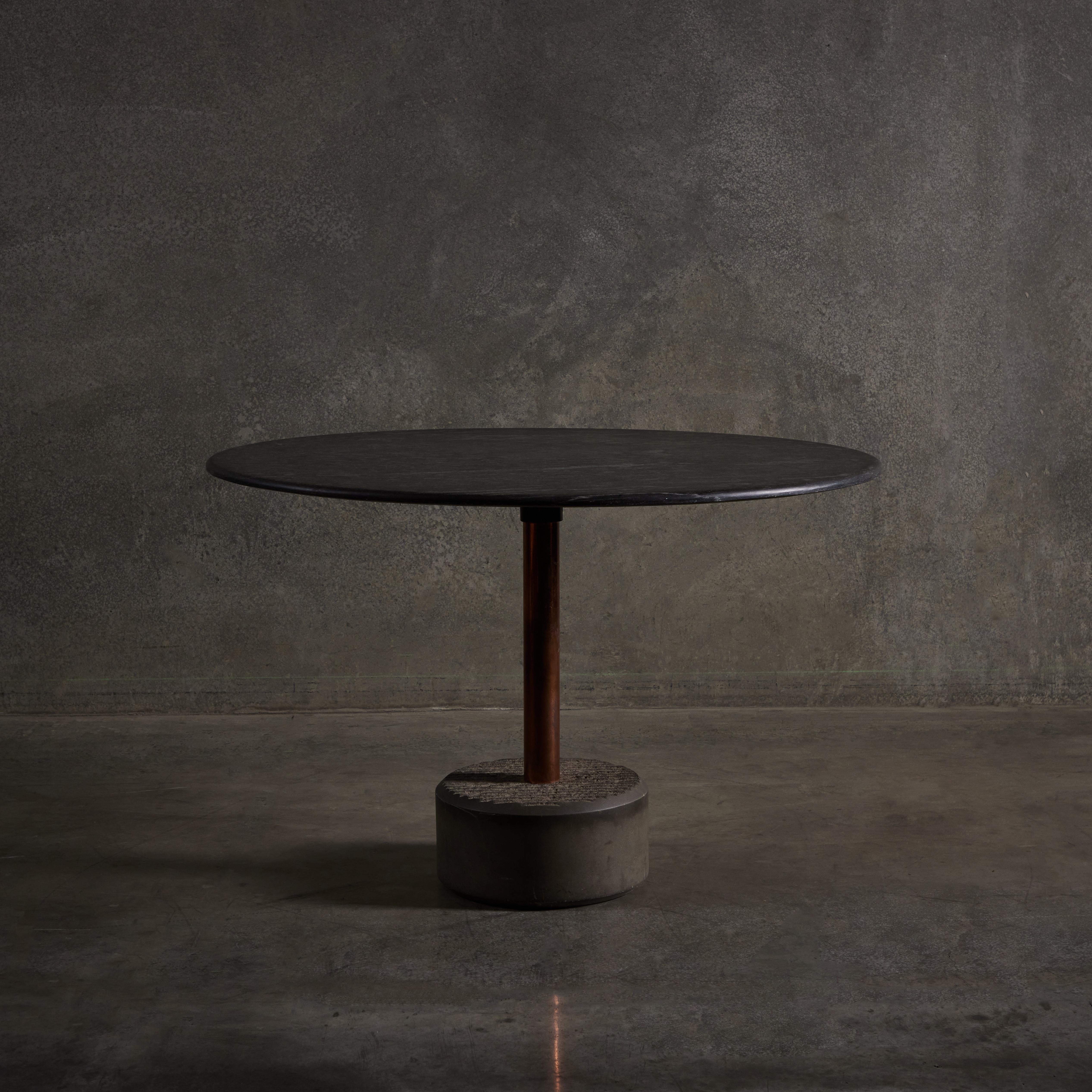 Table with etched grindstone base and marble top by Giulio Lazzotti for Mageia. Made in Italy circa 1981.

The name of the town where Giulio Lazzotti lives and works, Pietrasanta, can be alternately translated as Saint Peter or “holy stone,” the