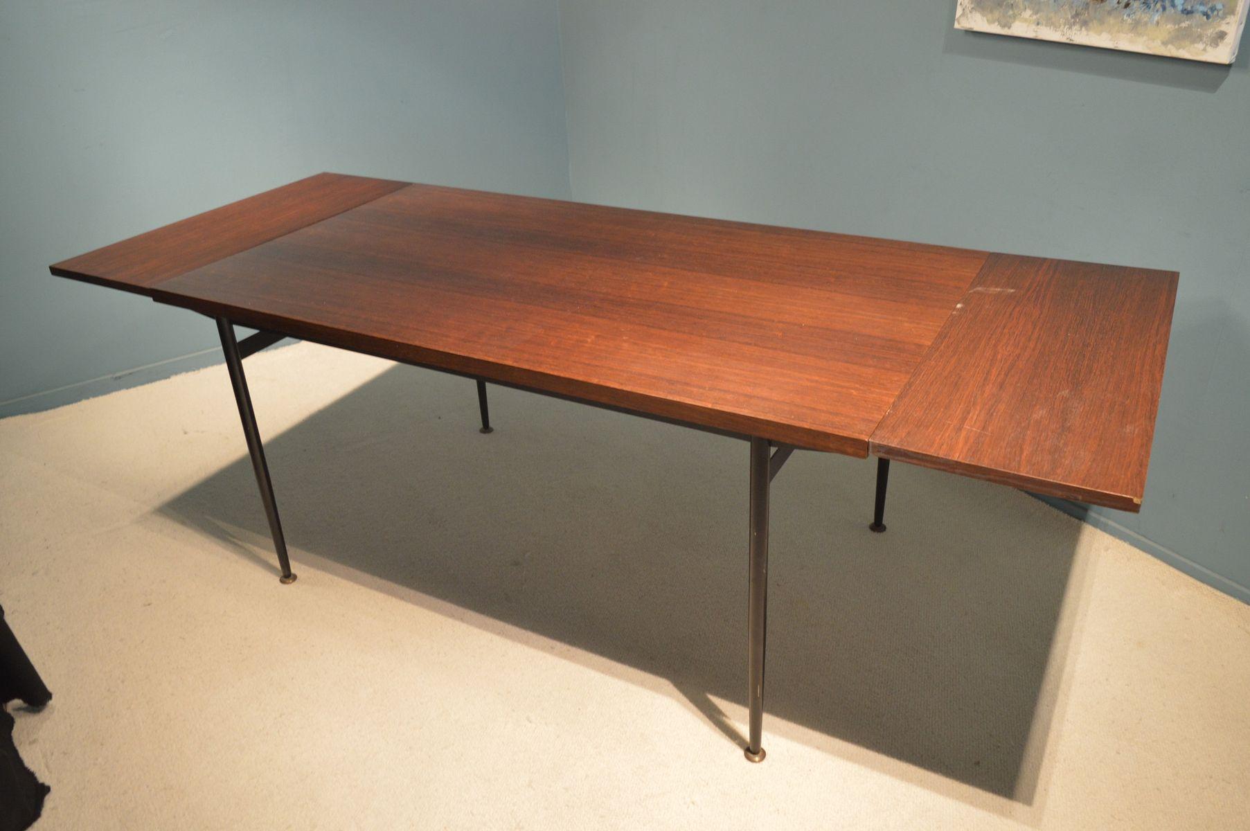Table by Louis Paolozzi in rosewood, lacqured metal and brass.
It get 2 extensions (13.38 inches long each).
French work, circa 1950.