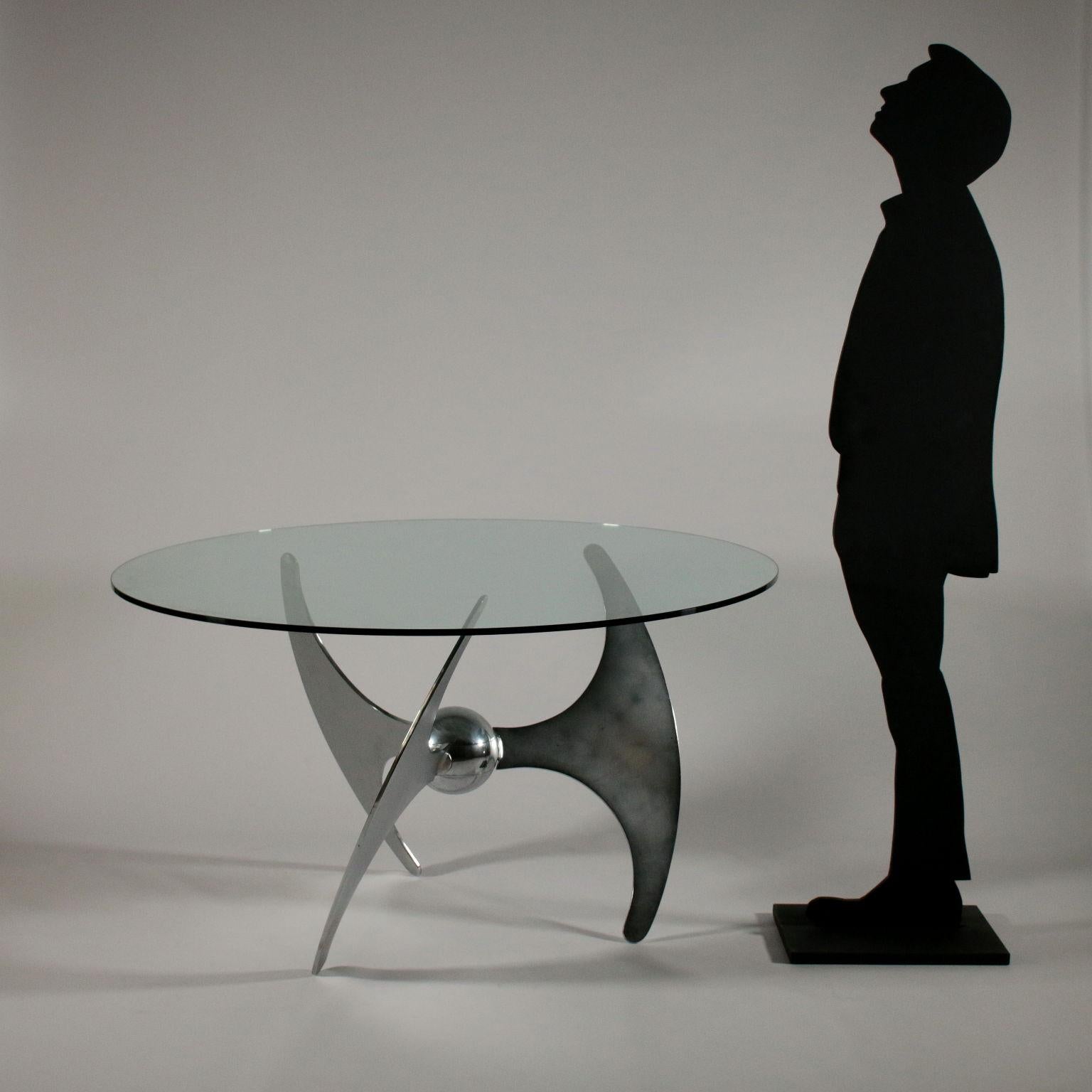 Table designed by Luciano Campanini for CAMA. Adjustable height, convertible in coffee table. Chromed metal, glass. Model: Propeller. Manufactured in Italy, 1970s.