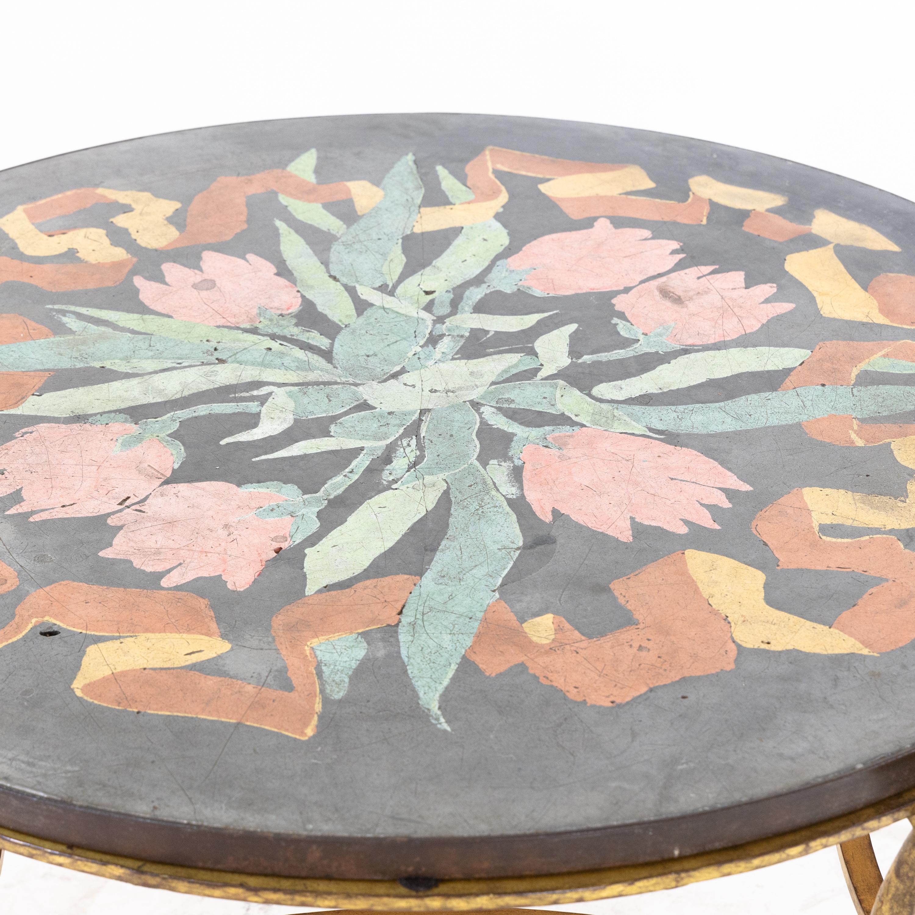Table on a hammered and gilded wrought iron feet by René Drouet (1899-1993) and Scagliola tabletop by Ismael Gonzales De La Serna, (1897-1968), France, circa 1938. Lit: Bruno Foucart, Jean-Louis Guillemin: Les décorateurs des années 40, edition