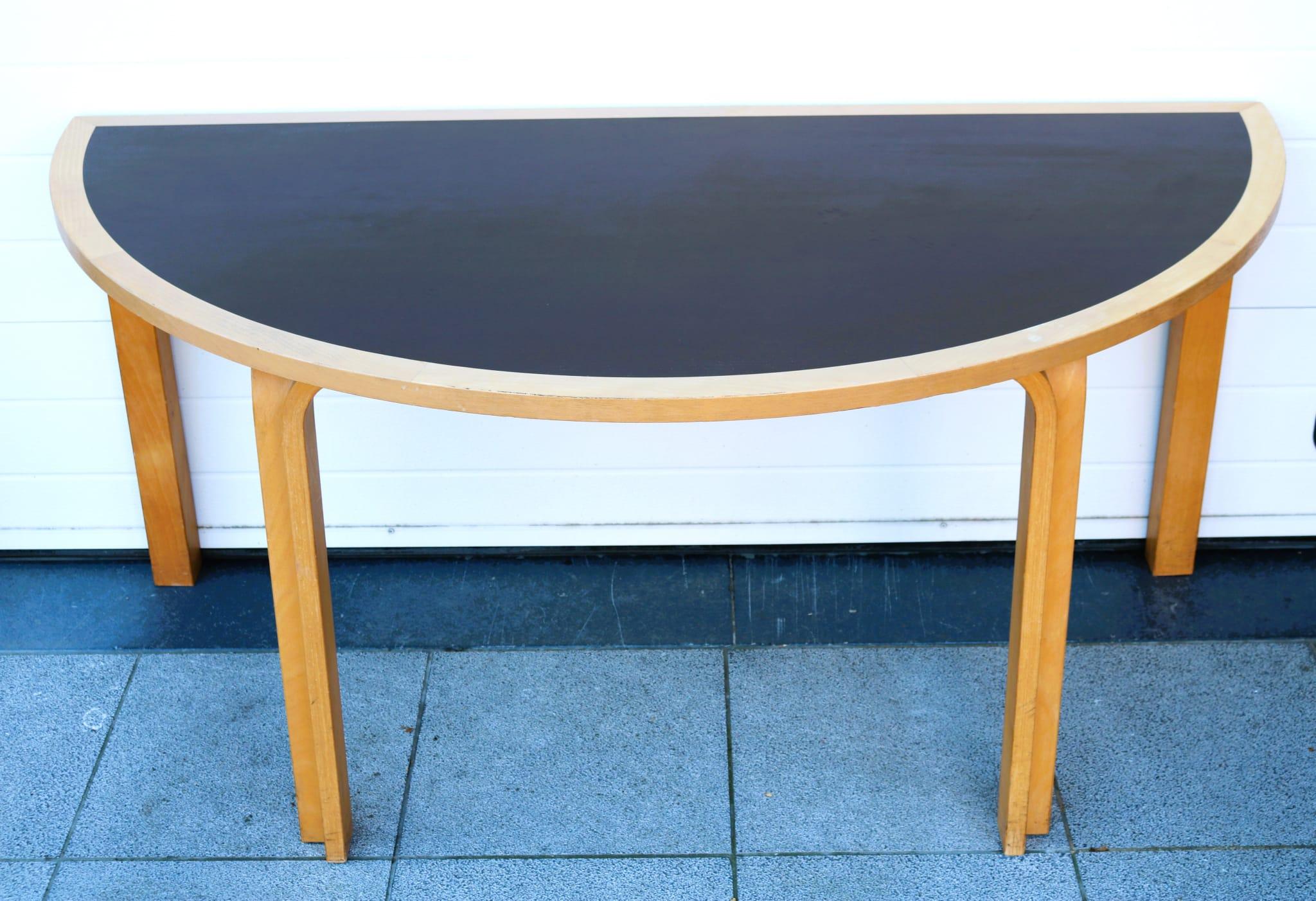 Half-table designed by Rud Thygesen&Johnny Sorenson for Magnus Olesen in the 1970's. Two available.