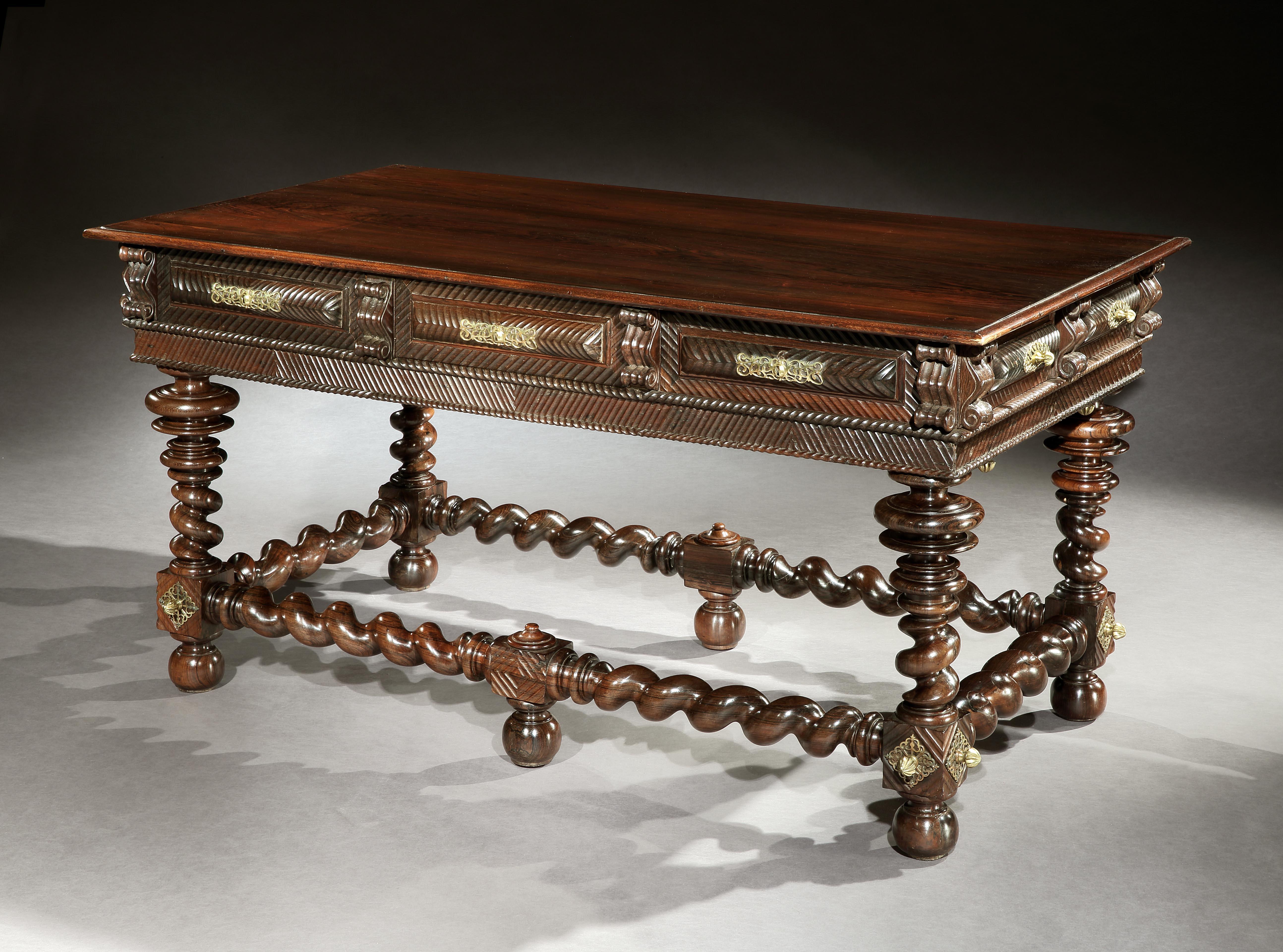 The design and ornamentation of this centre table is characteristic of Portuguese Baroque furniture dating from the second half of the 17th century. Made from Brazilian rosewood imported from Portugal’s great colony, incorporating tremidos in the