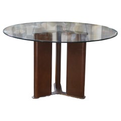 Table circulaire par Tito Agnoli pour Matteo Grassi piètement gainé de cuir brun