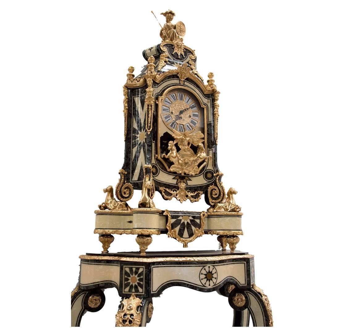 Unique and prestigious French style exclusive white and grey or green mother of pearl effect, clock and console with brass inlays and 24-karat gold plated bronzes.