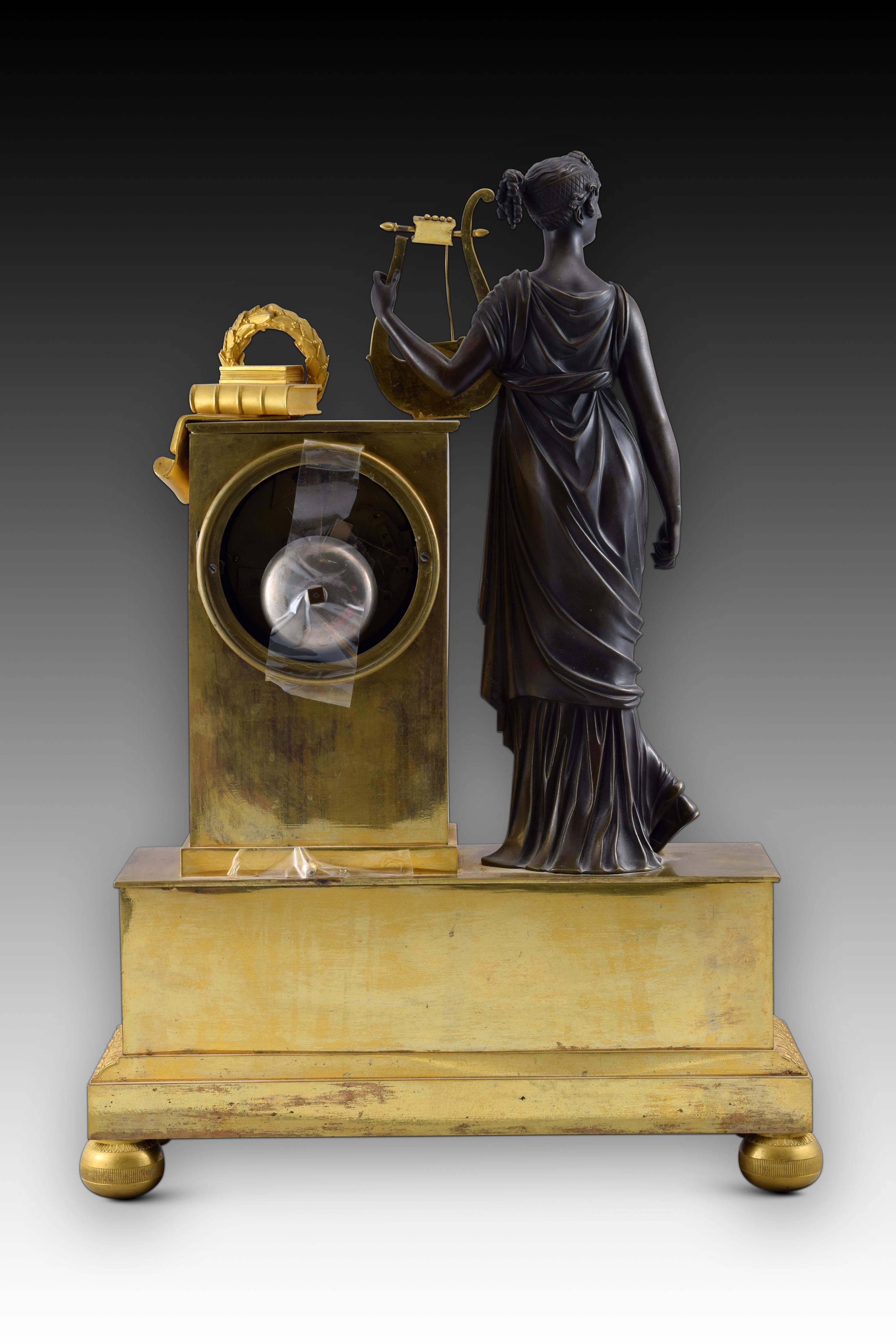 Table clock with Muse and writers. Blued and gilded bronze, Paris movement. France, 19th century. 

Perfectly working mechanism. 

Table clock in blued and gilt bronze with Paris machinery, and white dial with gilt bronze centre (Roman numerals for