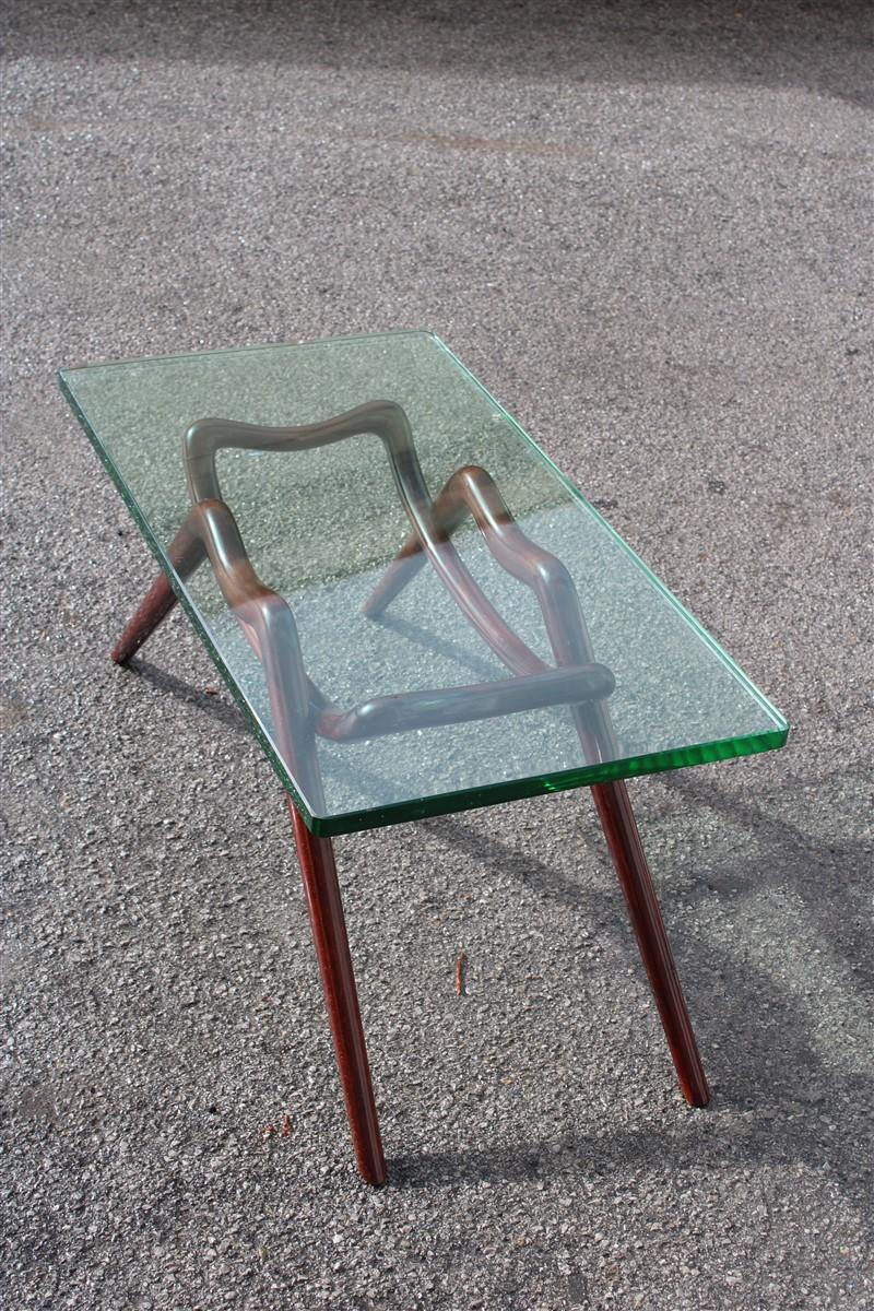 Table coffee midcentury design glass top foot curved mahogany wood Fontana Arte attributed 1950, green glass often.
Measures: Thickness 2 cm.
