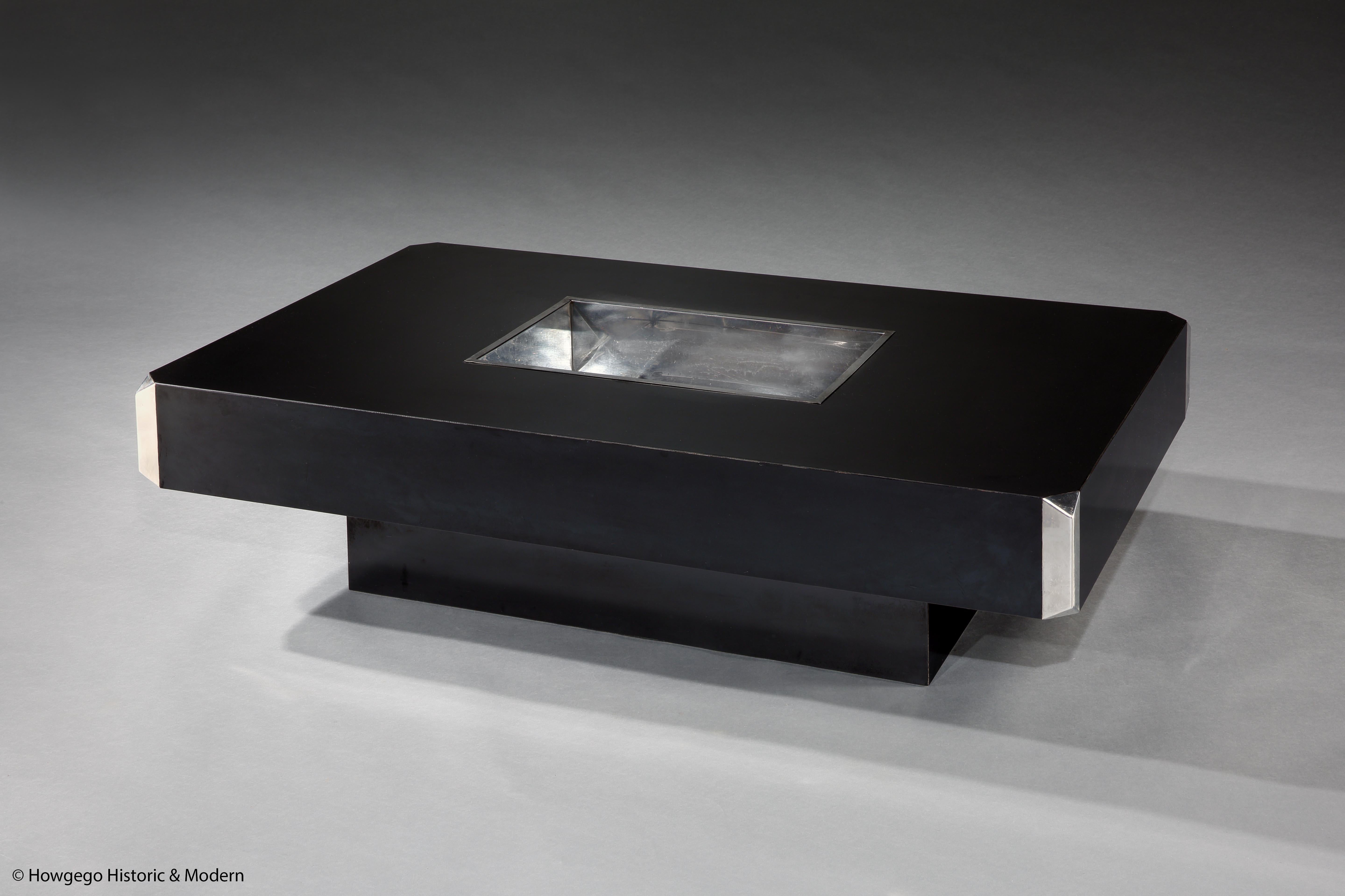 “It was about creating something new for a traditional setting.” Willy Rizzo, 'ALVEO' black lacquered and chromed coffee table, for Cidue, Italy, 1972-1973
- The recessed base creates the impression that the table is floating and lightens the