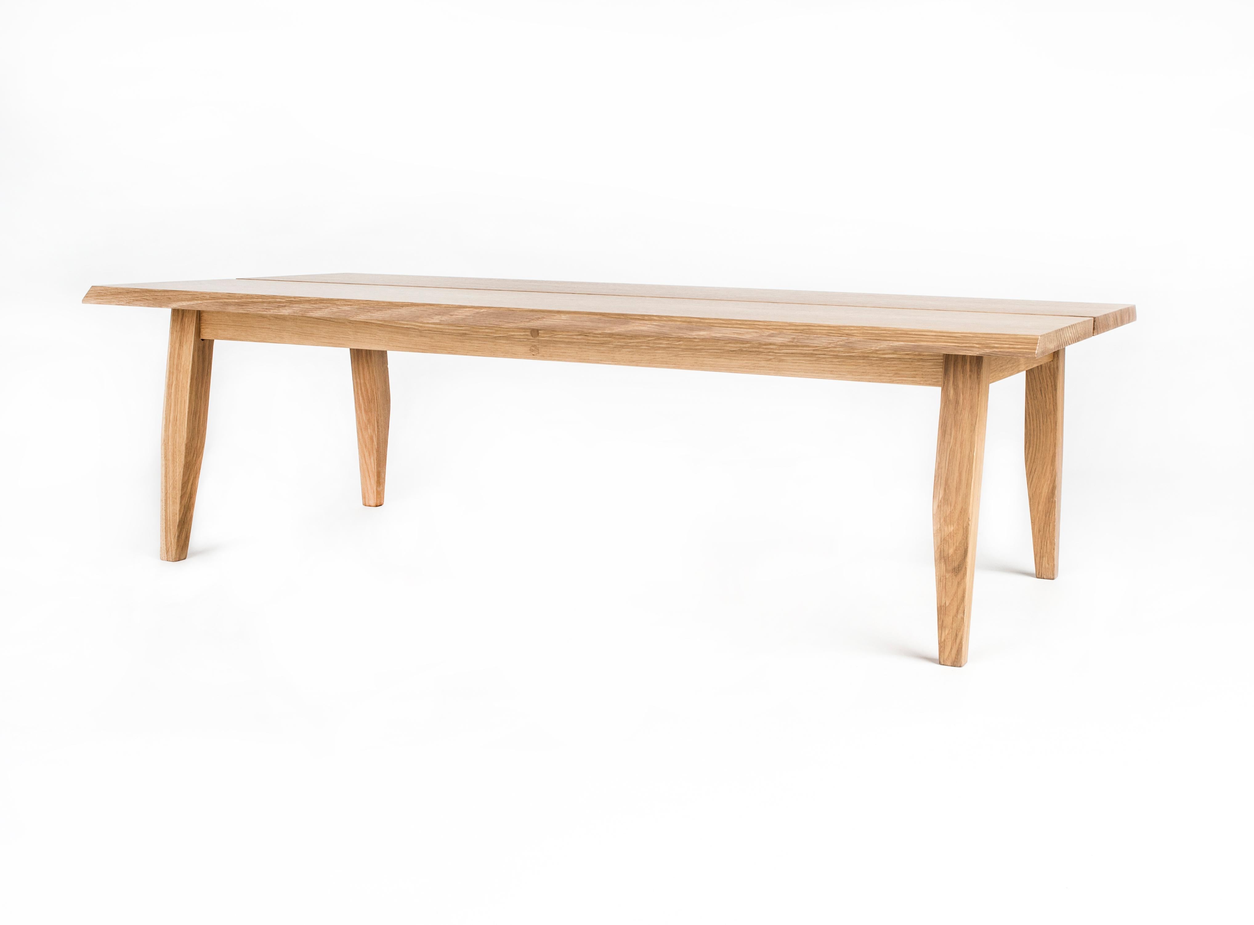 This low coffee table is made from hardwood brought together with the subtle tapers found in all the Rift pieces. Fits perfectly with lower modern sofas. Modern styling, handmade out of hardwood and shown here in white oak. Perfect for apartment