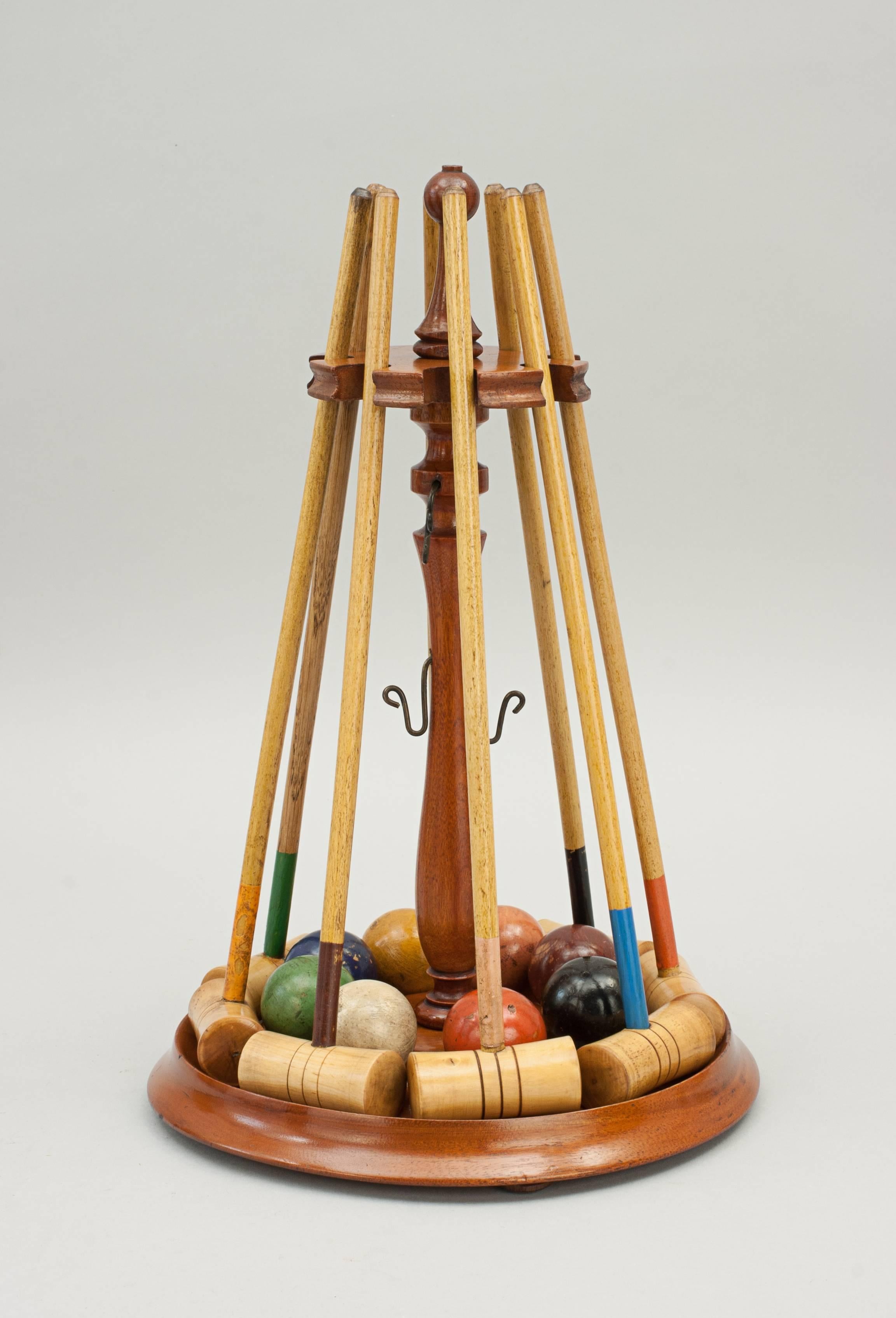 Miniature croquet set.
An original parlour game of miniature croquet. The tabletop croquet set comes on its original turned mahogany stand and original pine box. The set contains 8 mallets and balls all made of boxwood. To complete the set there