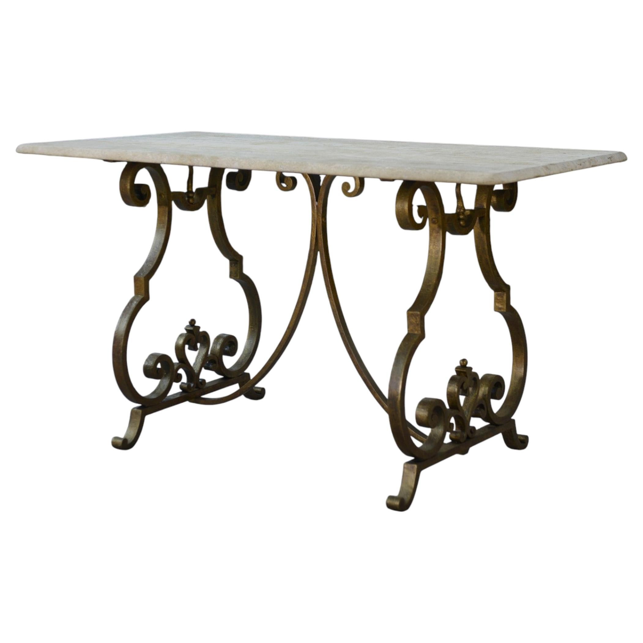 Table d'appoint piètement en fer forgé doré à la feuille Gilbert Poillerat For Sale