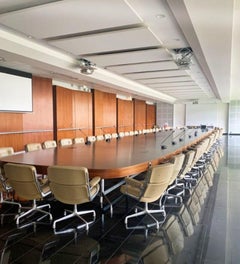 Table de conférence en noyer et inox brossé exemplaire unique par Charles Eames
