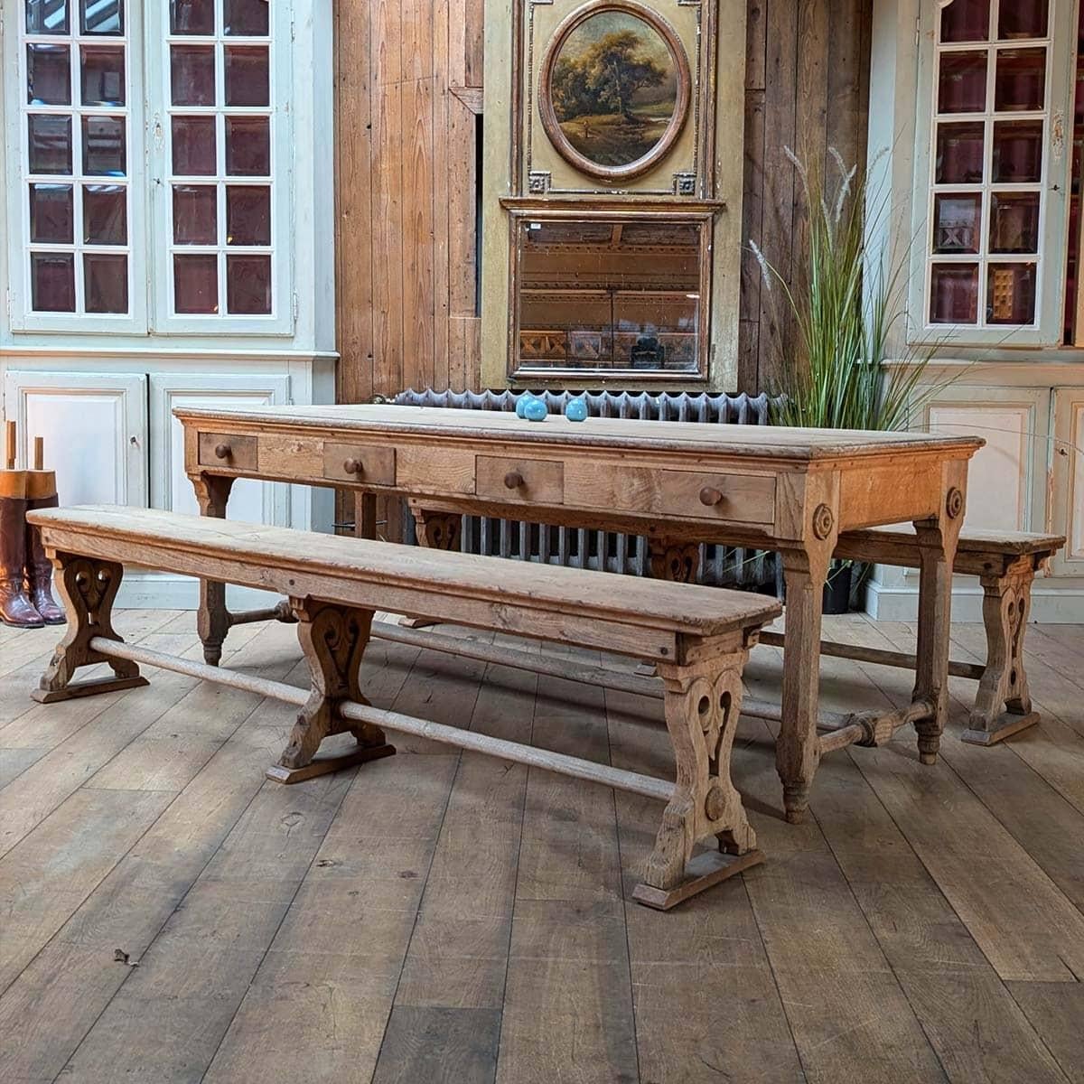 Convent Table with Pair of Benches
Magnificent solid wood convent table with its pair of benches, a testament to exceptional craftsmanship. Its understated yet robust design makes it a timeless piece, perfect for a dining room or a convivial space