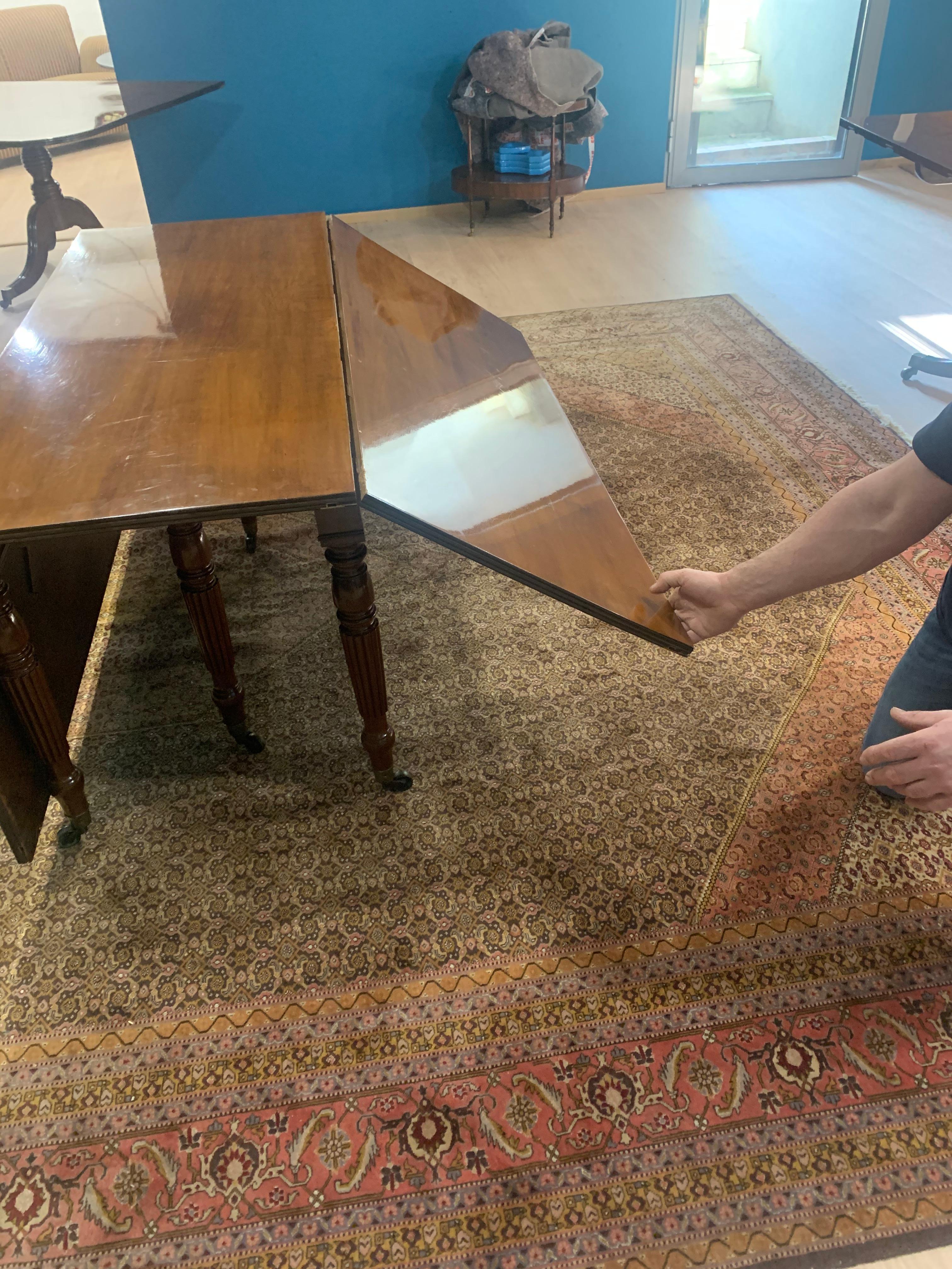  Dining table combined with another table on legs in extension. In Good Condition In Paris, FR