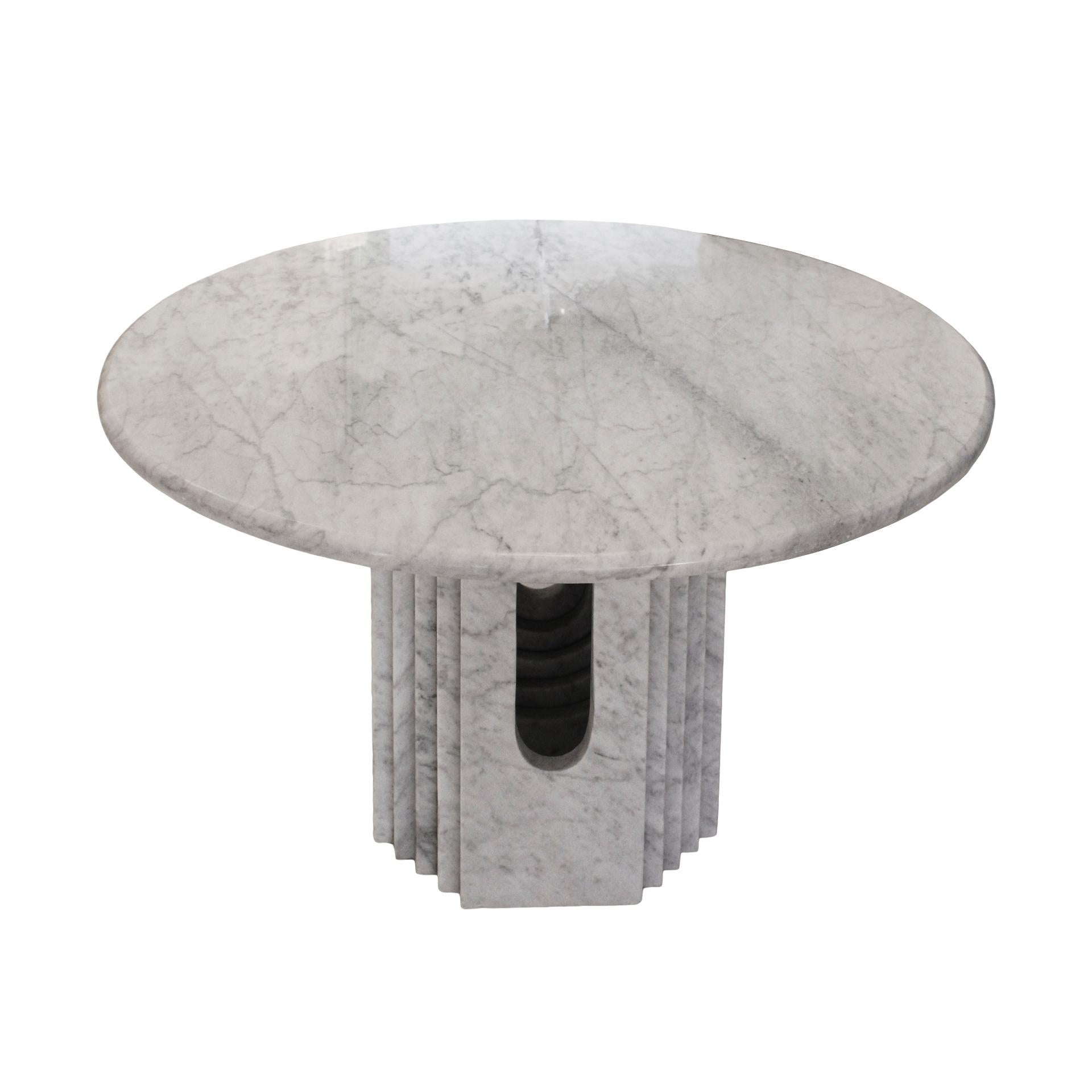 Postmodernist pedestal table with Carrara marble sculpture base designed by Carlo Scarpa for Cattelan in Italy, 1970s.

Measurements: Diameter 117 x H 73 cm

Alberto Carlo Scarpa was born on June 2 in Venice, the son of Antonio Scarpa, and Emma