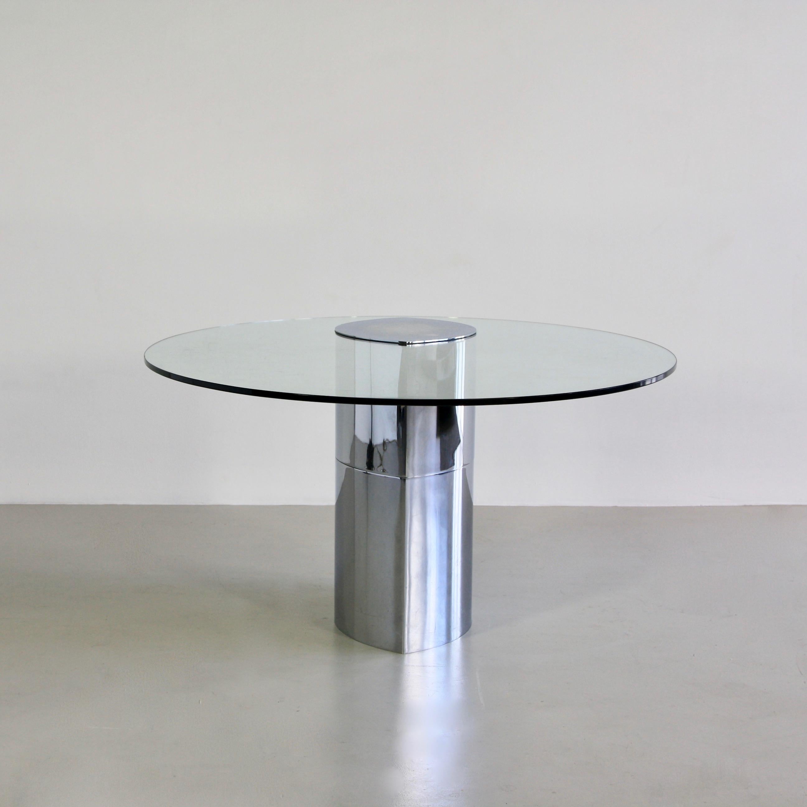 The Lunario table, consisting of a weighted chrome base with cantilevered glass top, both in matching elliptical shape. Superb minimalist design by Boeri. Gavina, the producing company of this table was taken over by Knoll International during