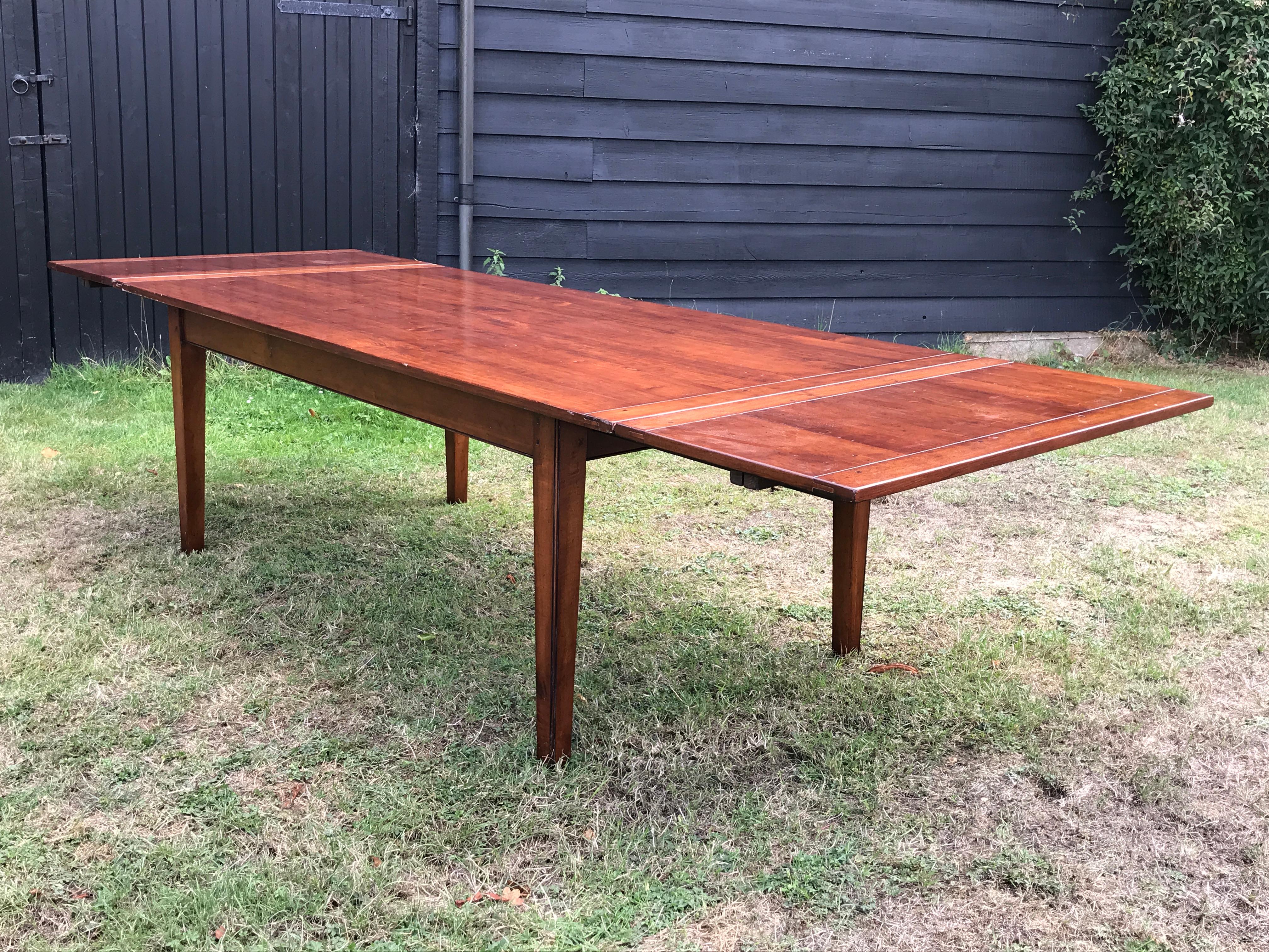 - Cherrywood is much prized for its rich colour and beautiful figuring. The trees grow to a small size so it is unusual to find a large piece made from this fruitwood
- The drawleaf is a practical model and this table can be used as a desk, for
