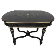 Tavolo in bois laqué noir con decoro centrale intarsiato di laiton, Napoléon III