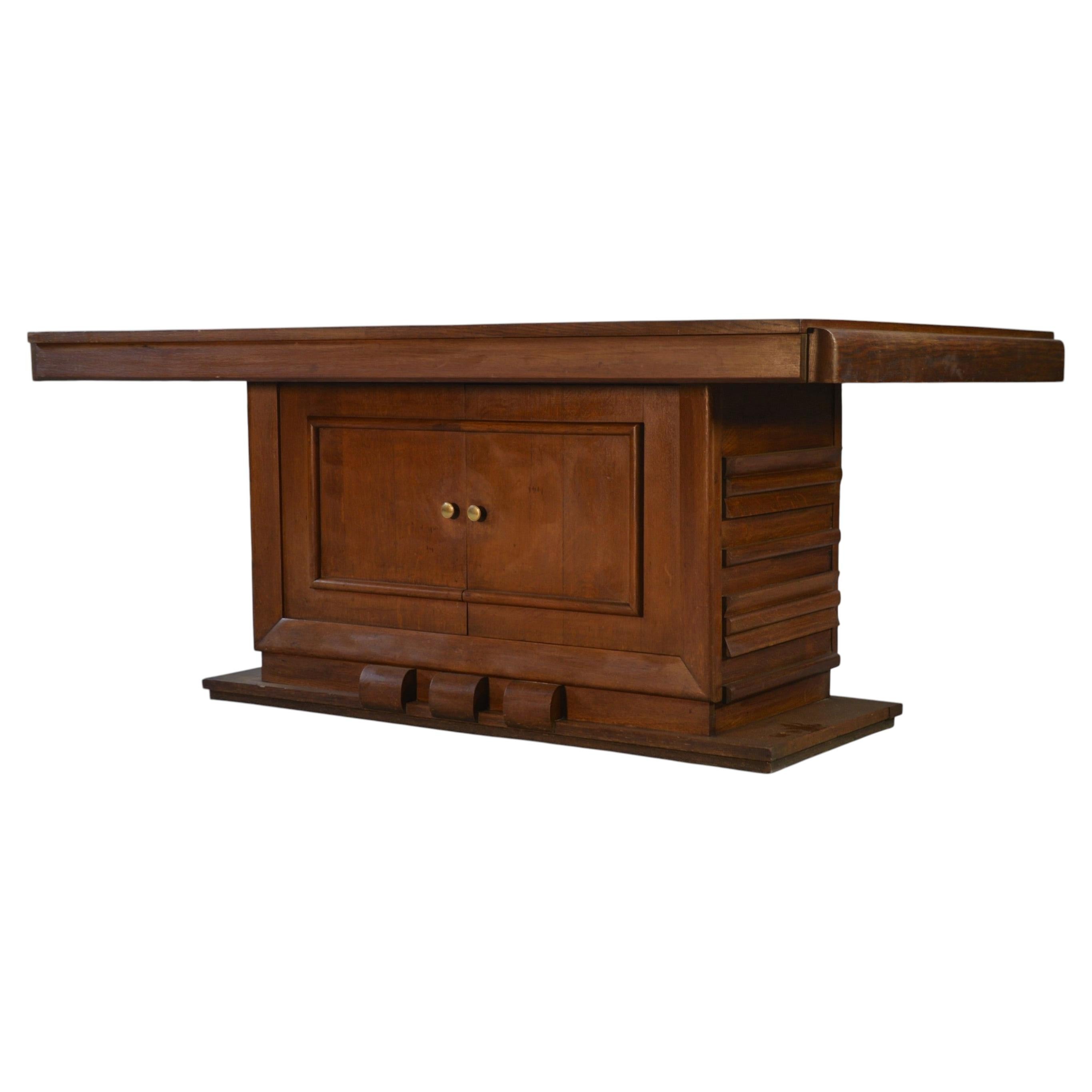 Table en chêne massif piètement central avec rangement Charles Dudouyt 1950's For Sale