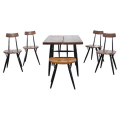 Table et chaises d’Ilmari Tapiovaara “Pirkka” pour Laukaan Puu