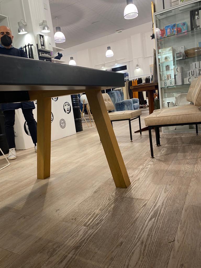 This table is designed by Architetti Associati in Italy it is a particulare and style table the size is cm 300-cm 80-cm 73, in wood and metal lastre top, is contemporaney interiors.
