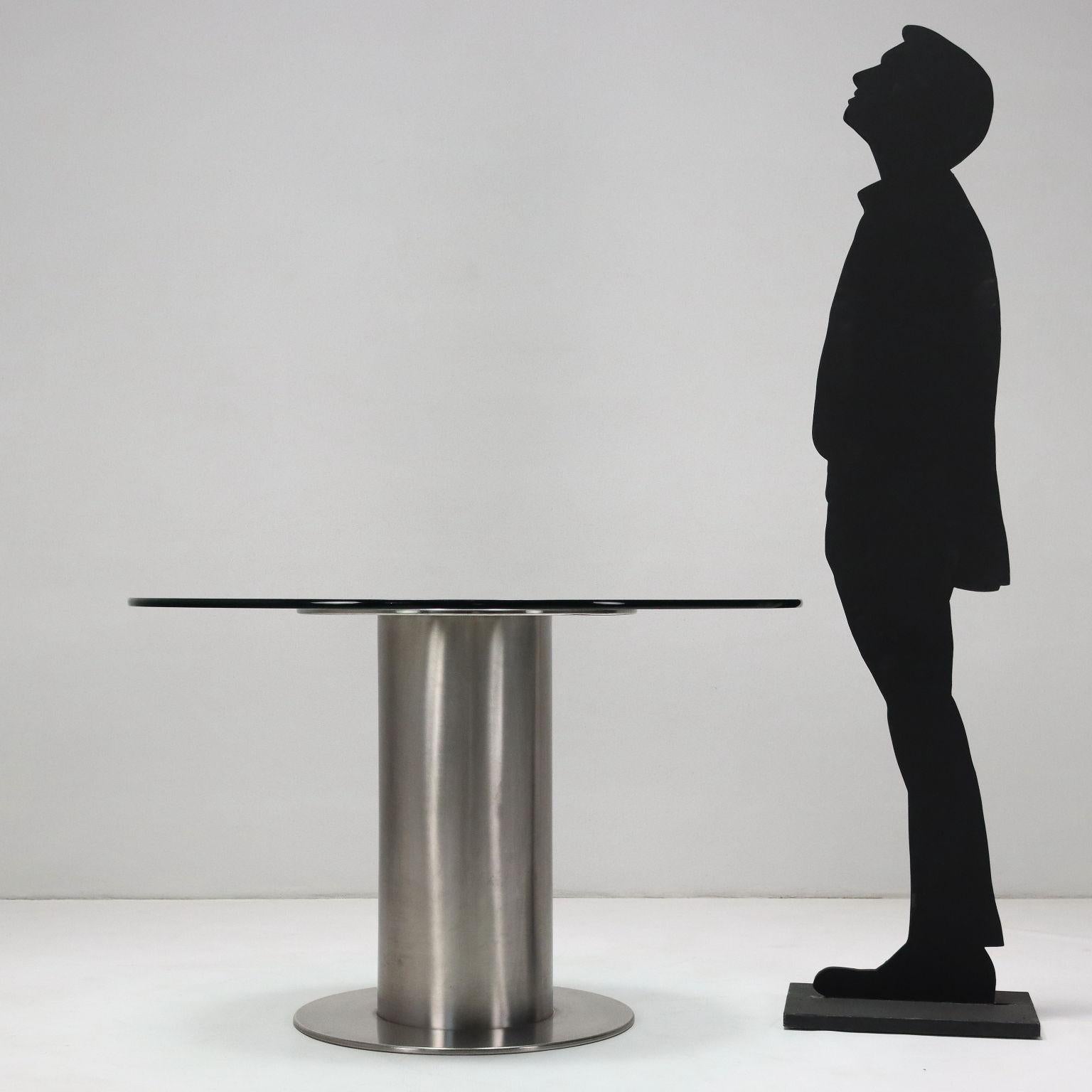 Table; chromed metal base, glass top.