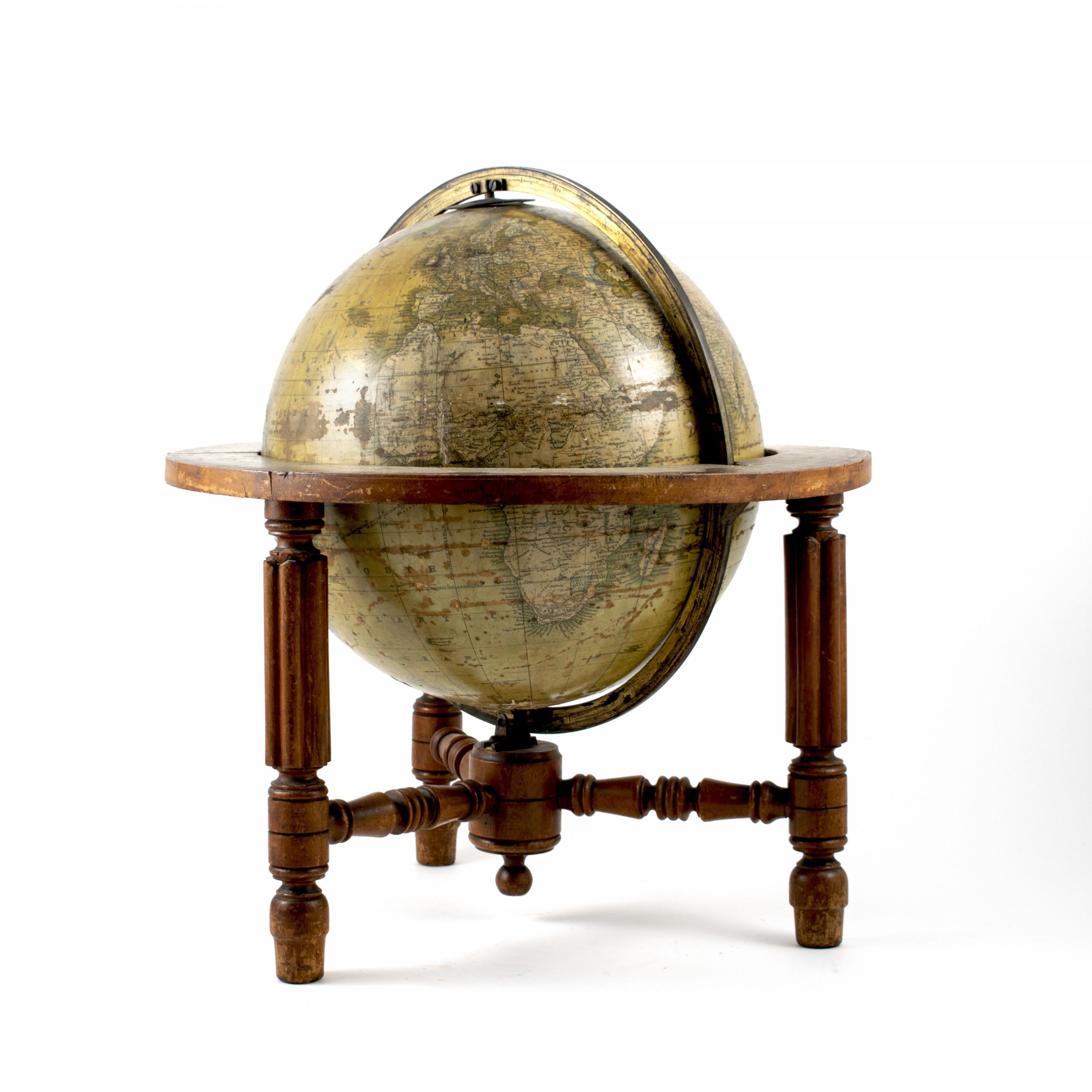 A terrestrial table globe, James Wyld, London.
Supported by a turned mahogany stand with three legs,
England, mid-18th century.
Original untouched condition, patina consistent with age and use.
  